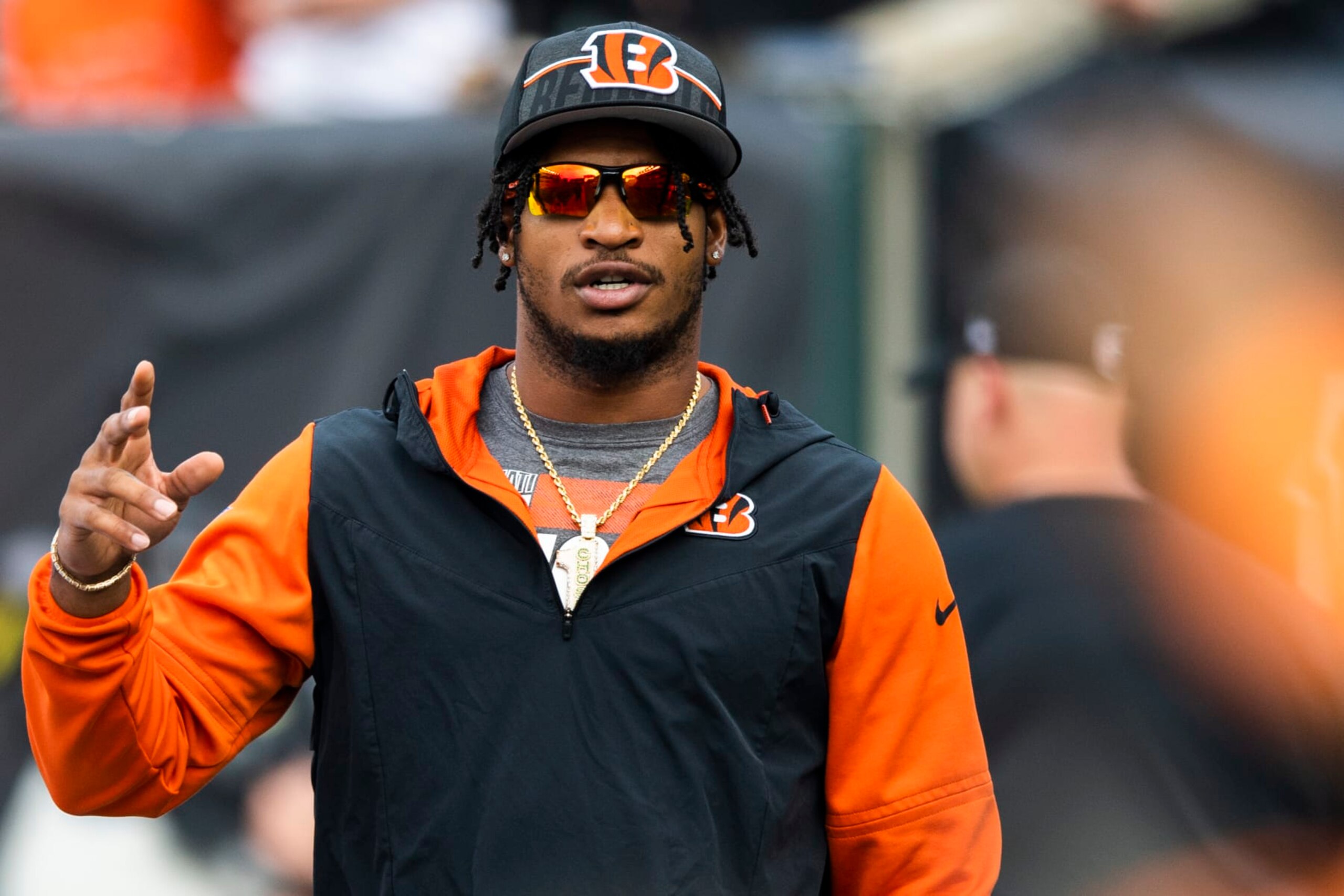 Cincinnati Bengals wide receiver Ja'Marr Chase (1) waves to fans before a preseason NFL football game against the Green Bay Packers Friday, Aug. 11, 2023, in Cincinnati. (AP Photo/Emilee Chinn)