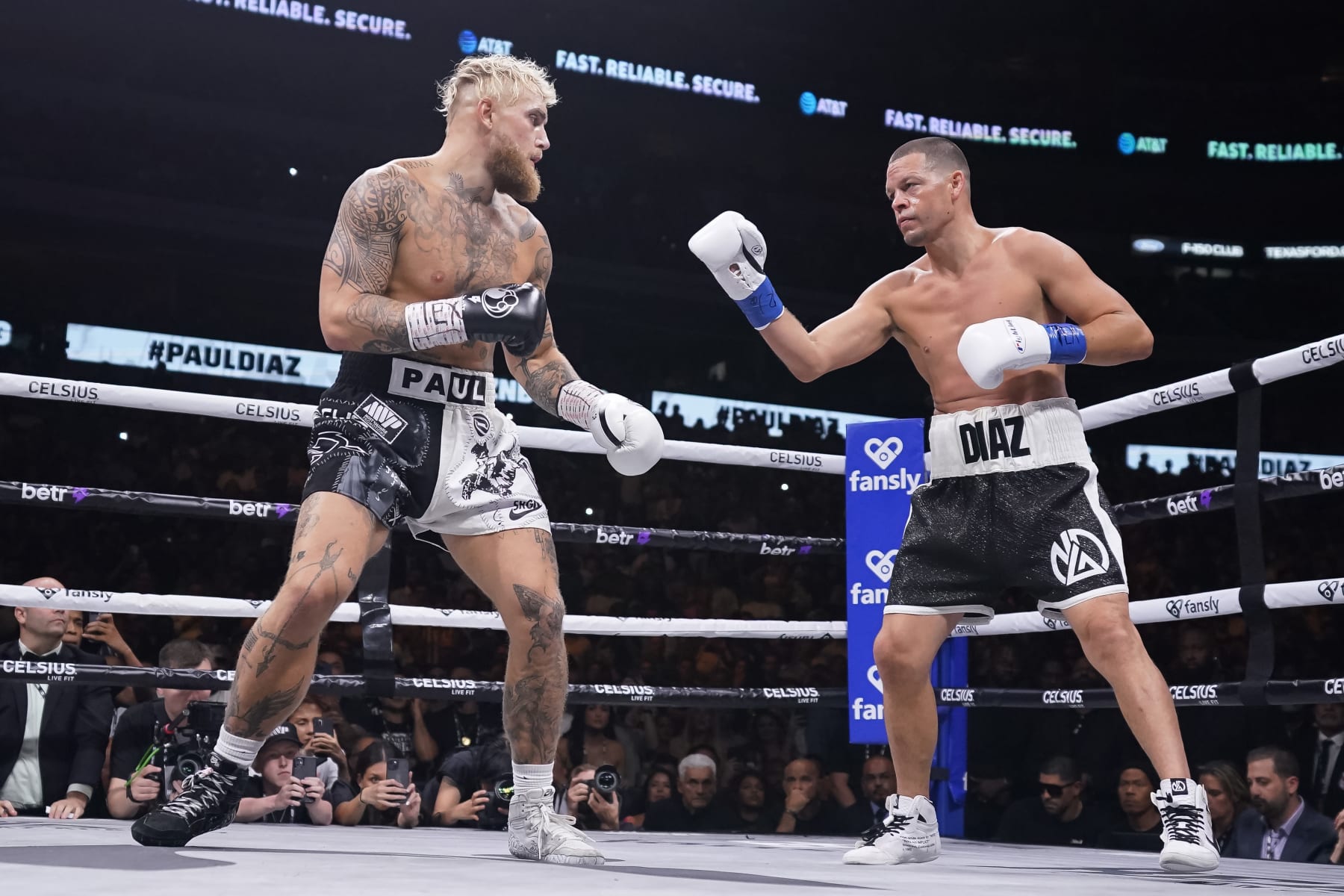 DALLAS, TEXAS - AUGUST 05: Jake Paul(L) and Nate Diaz(R) face off during the first round of their fight at the American Airlines Center on August 05, 2023 in Dallas, Texas. (Photo by Sam Hodde/Getty Images)
