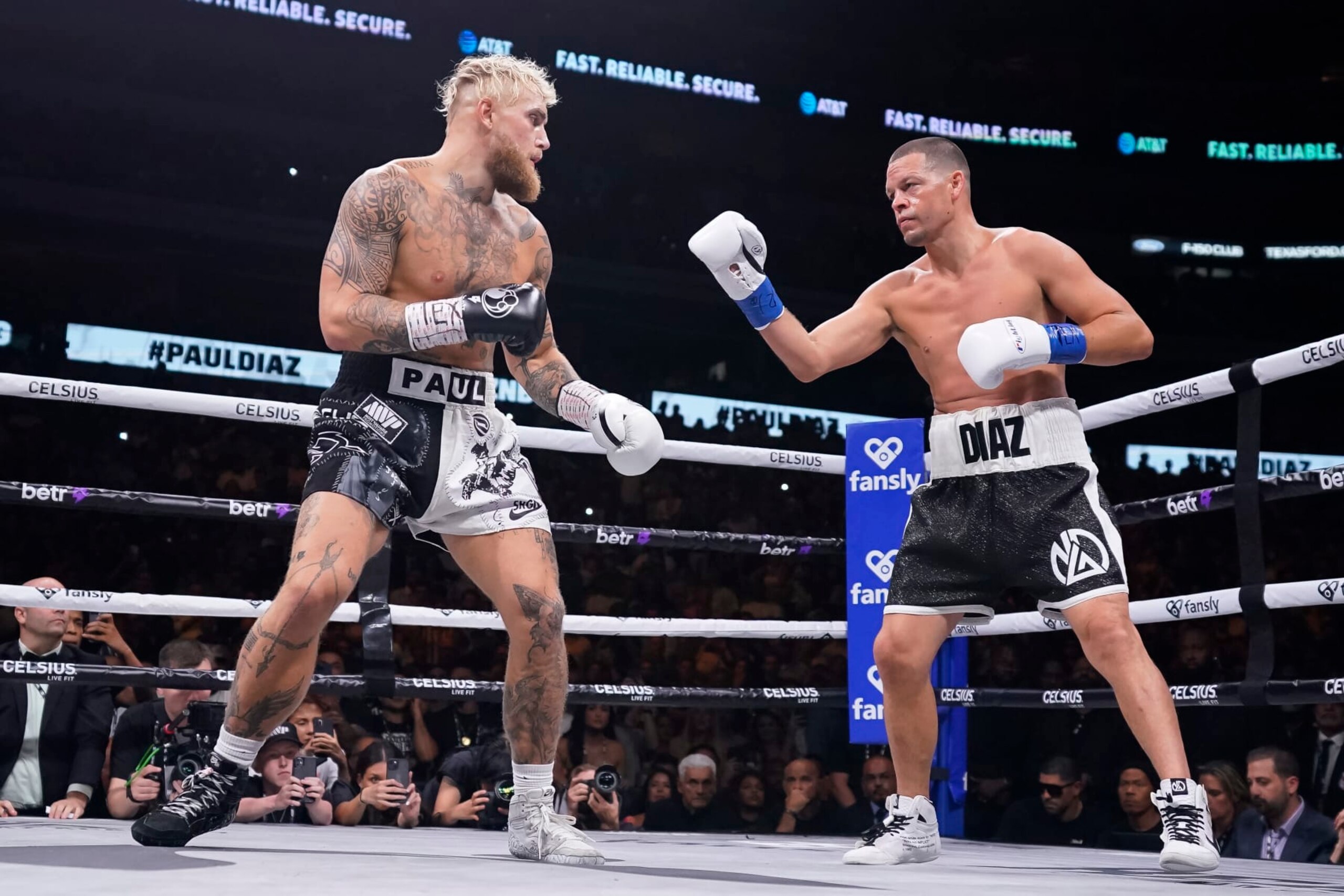 DALLAS, TEXAS - AUGUST 05: Jake Paul(L) and Nate Diaz(R) face off during the first round of their fight at the American Airlines Center on August 05, 2023 in Dallas, Texas. (Photo by Sam Hodde/Getty Images)