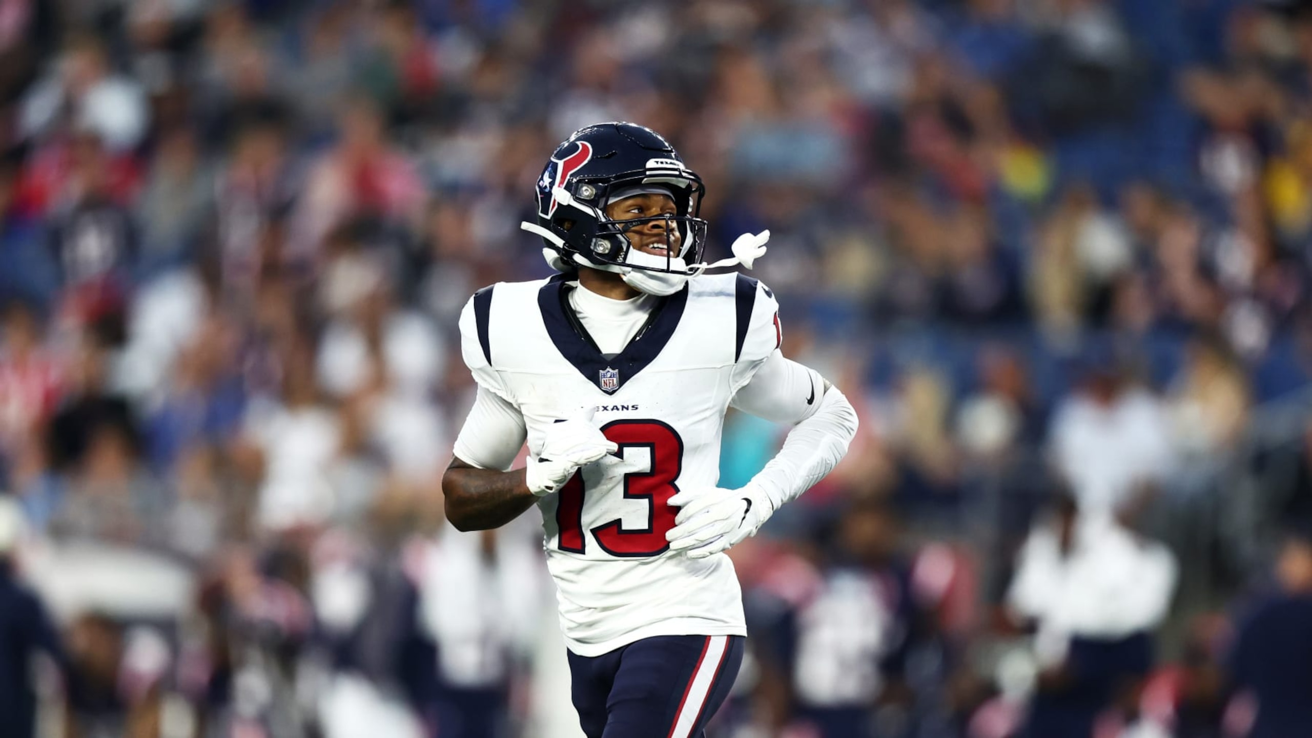 FOXBOROUGH, MASSACHUSETTS - AUGUST 10: Tank Dell #13 of the Houston Texans looks on during the first quarter during the preseason game against the New England Patriots at Gillette Stadium on August 10, 2023 in Foxborough, Massachusetts. (Photo by Omar Rawlings/Getty Images)