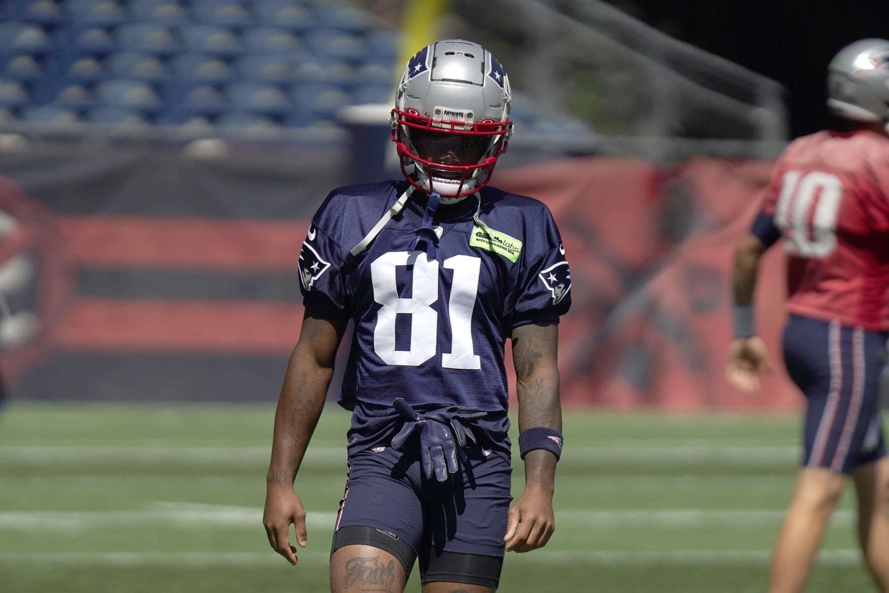 New England Patriots wide receiver Demario Douglas (81) warms up during an NFL football practice, Thursday, Aug. 31, 2023, in Foxborough, Mass. (AP Photo/Steven Senne)