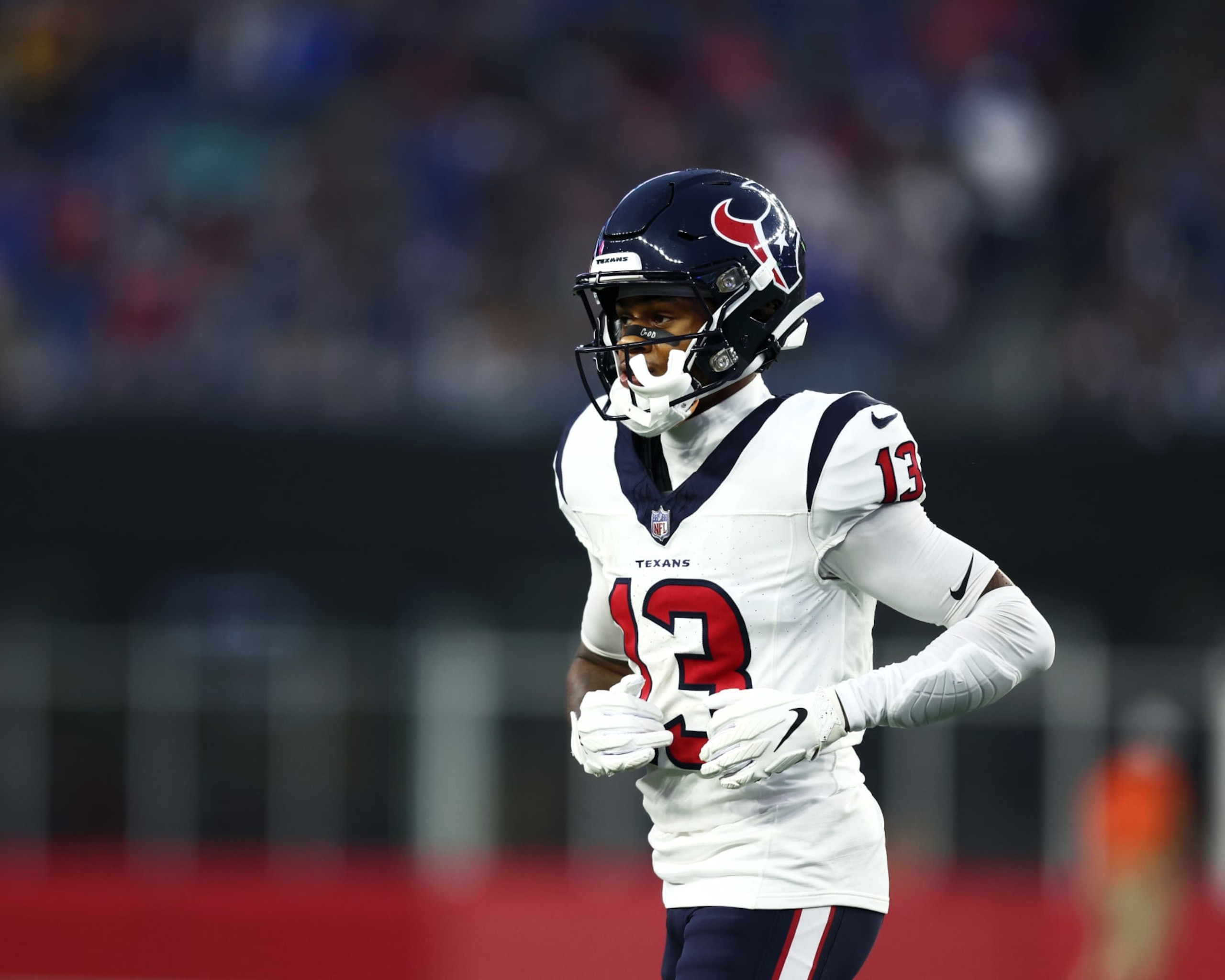 FOXBOROUGH, MASSACHUSETTS - AUGUST 10: Tank Dell #13 of the Houston Texans looks on during the first quarter of the preseason game against the New England Patriots at Gillette Stadium on August 10, 2023 in Foxborough, Massachusetts. (Photo by Omar Rawlings/Getty Images)