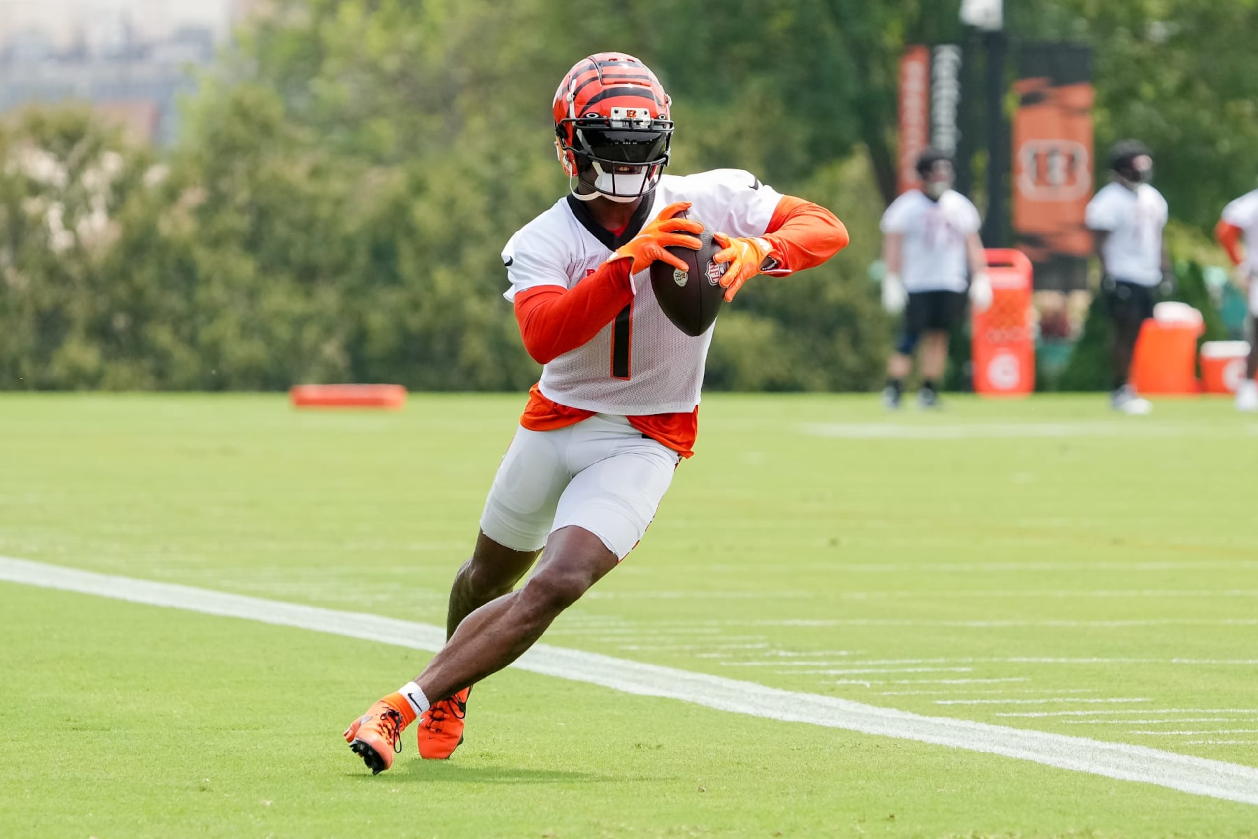 CINCINNATI, OHIO - JULY 26: Ja'Marr Chase #1 of the Cincinnati Bengals participates in a drill during training camp at Kettering Health Practice Fields on July 26, 2023 in Cincinnati, Ohio. (Photo by Dylan Buell/Getty Images)