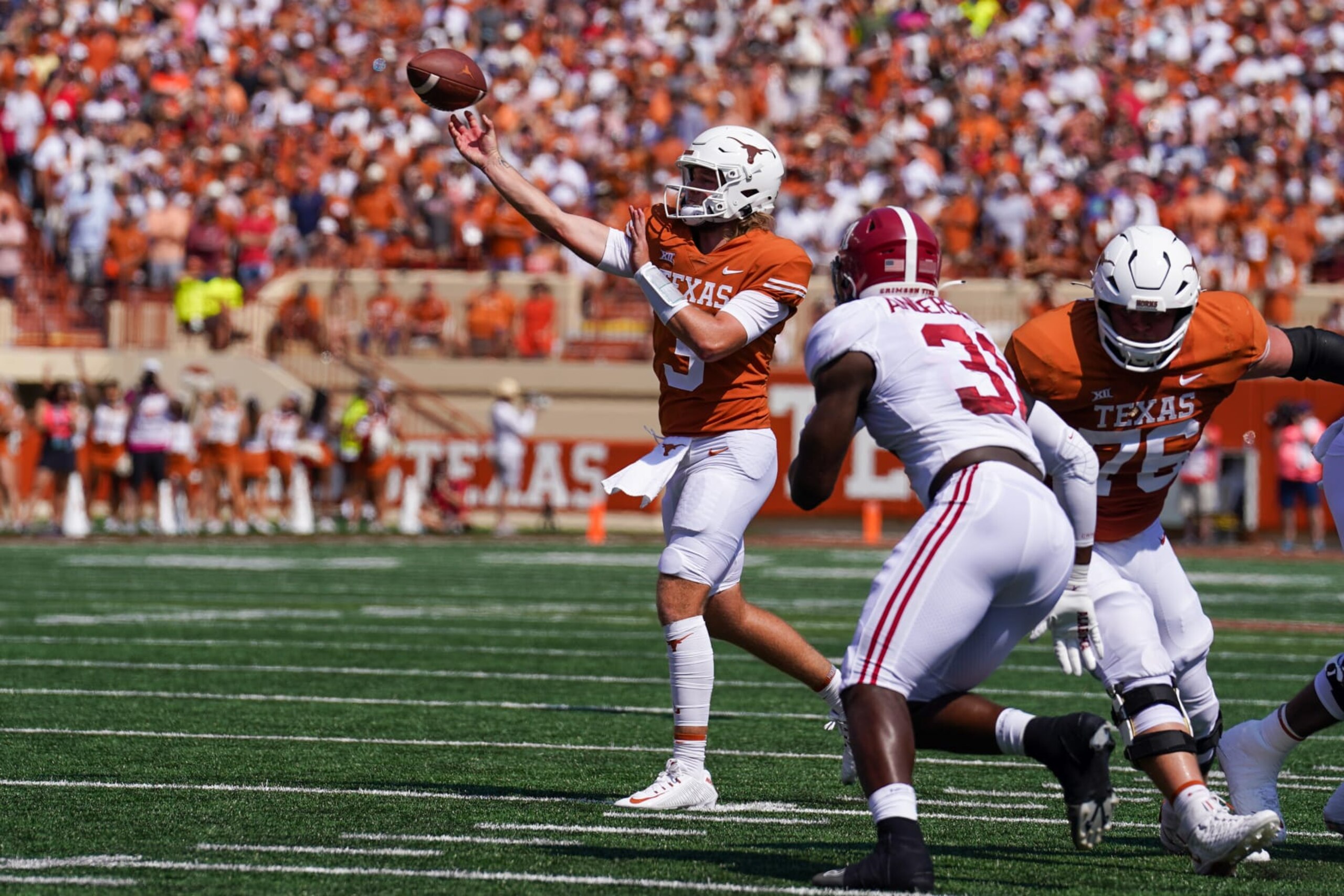 AUSTIN, TX - SEPTEMBER 10: Texas Longhorns quarterback Quinn Ewers (3) throws a pass in front of Alabama Crimson Tide linebacker Will Anderson Jr. (31) during the game between the Alabama Crimson Tide and the Texas Longhorns on September 10, 2022, at Darrell K Royal-Texas Memorial Stadium in Austin, Texas.  (Photo by Daniel Dunn/Icon Sportswire via Getty Images)