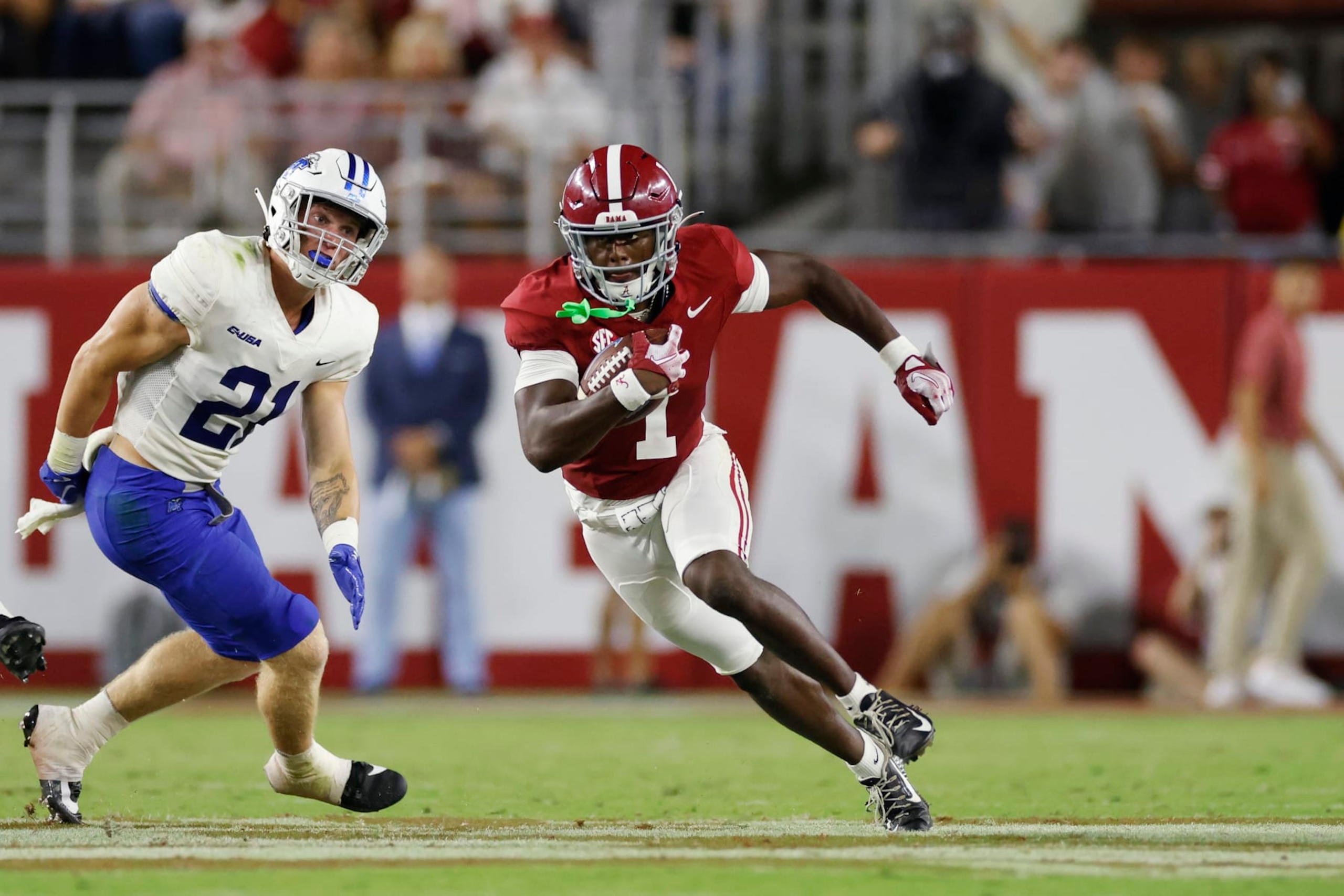TUSCALOOSA, AL - SEPTEMBER 02: Alabama Crimson Tide defensive back Kool-Aid McKinstry (1) runs with the ball on a punt return during a college football game against the Middle Tennessee Blue Raiders on September 02, 2023 at Bryant-Denny Stadium in Tuscaloosa, Alabama. (Photo by Joe Robbins/Icon Sportswire via Getty Images)