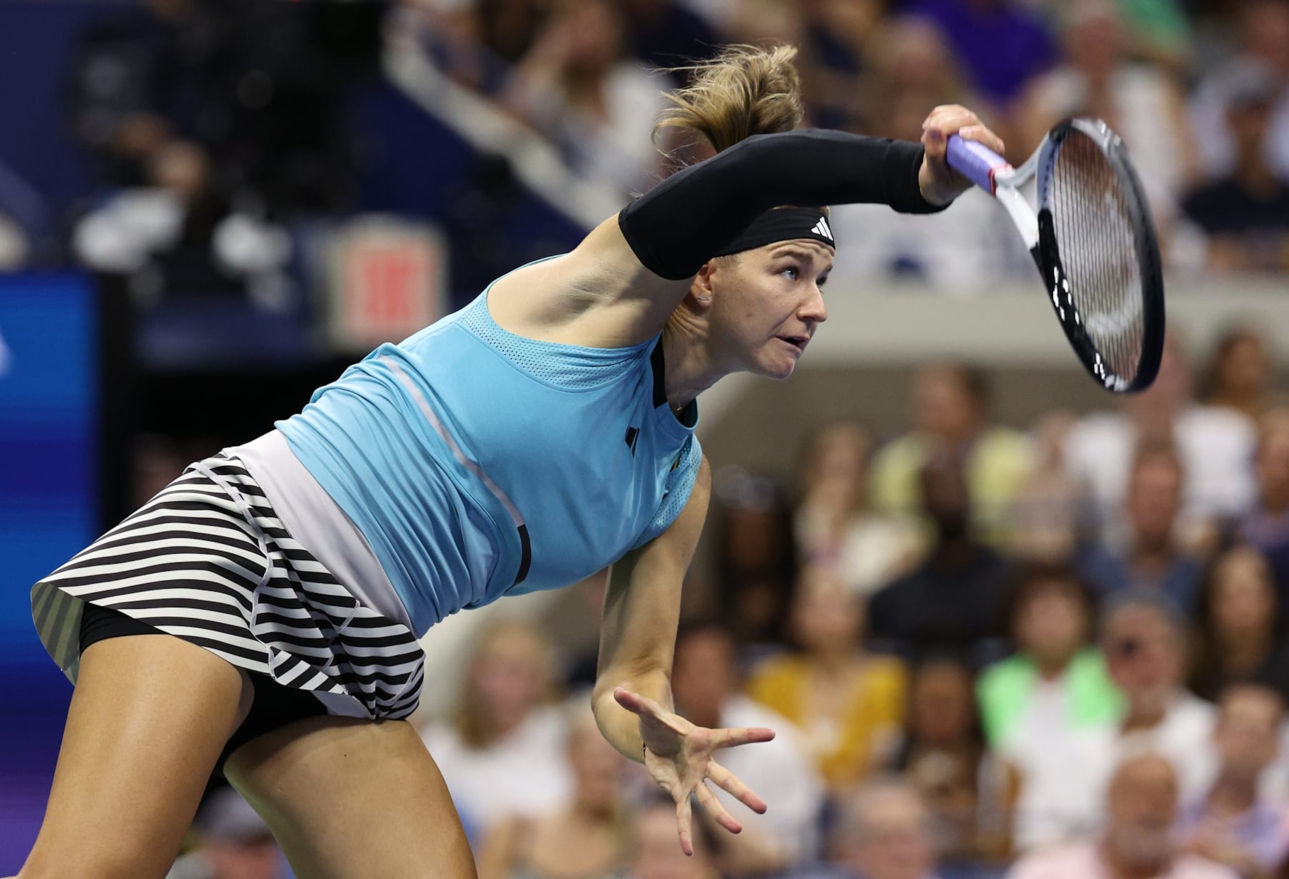 NEW YORK, NEW YORK - SEPTEMBER 07: Karolina Muchova of the Czech Republic serves against Coco Gauff of the United States during their Women's Singles Semifinal match on Day Eleven of the 2023 US Open at the USTA Billie Jean King National Tennis Center on September 07, 2023 in the Flushing neighborhood of the Queens borough of New York City. (Photo by Elsa/Getty Images)