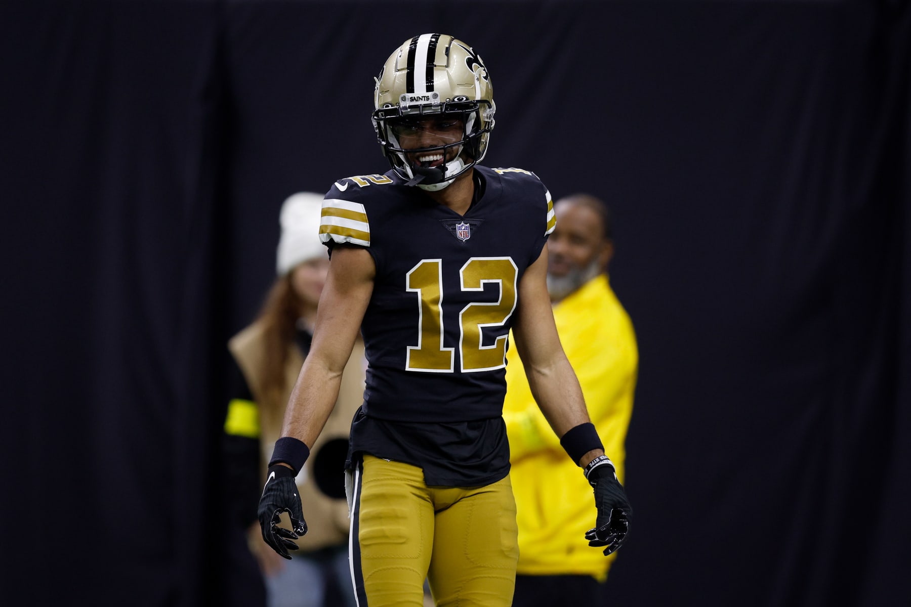 NEW ORLEANS, LOUISIANA - NOVEMBER 20: Chris Olave #12 of the New Orleans Saints celebrates after scoring a touchdown against the Los Angeles Rams during the third quarter at Caesars Superdome on November 20, 2022 in New Orleans, Louisiana. (Photo by Sean Gardner/Getty Images)