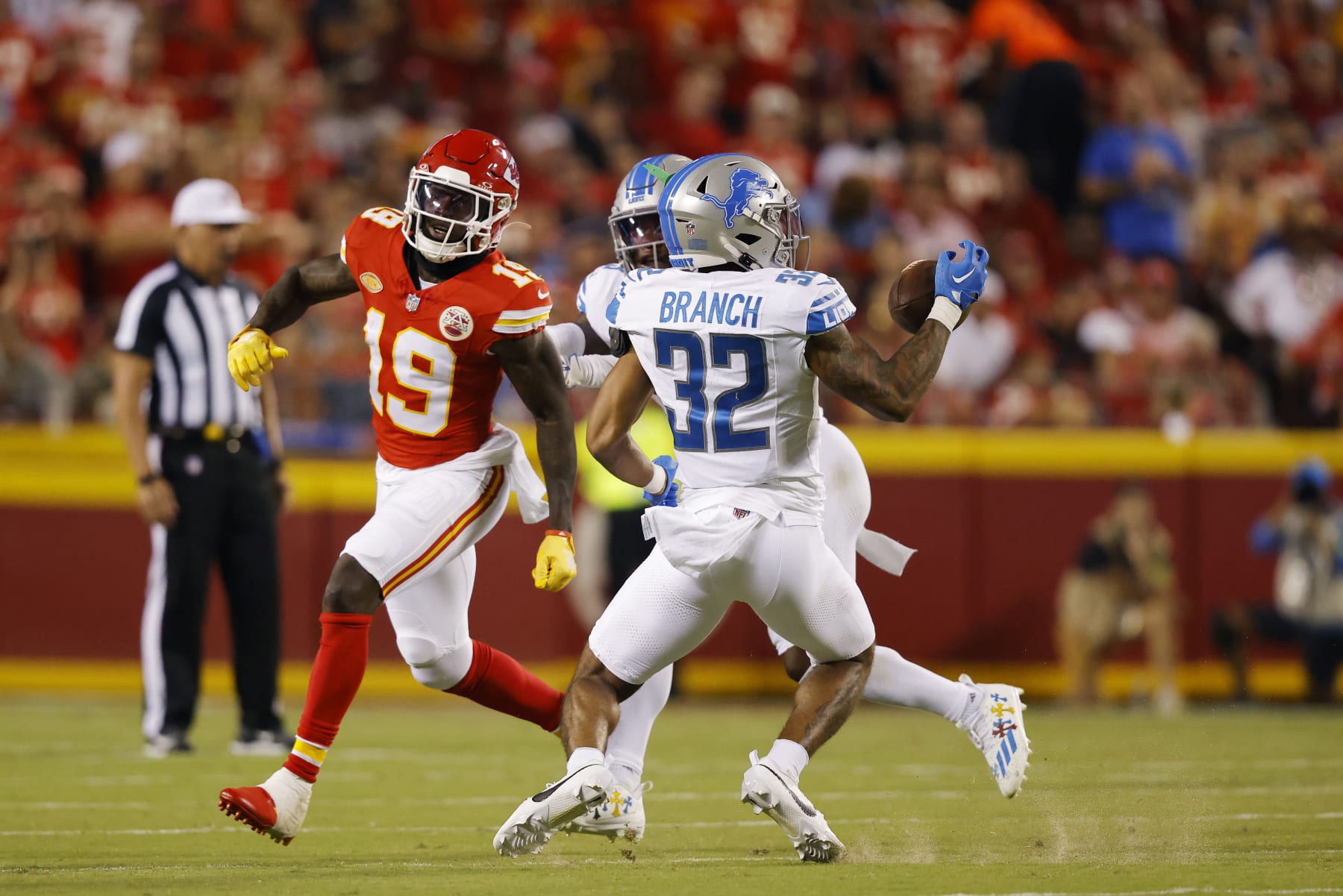 KANSAS CITY, MISSOURI - SEPTEMBER 07: Brian Branch #32 of the Detroit Lions intercepts a pass intended for Kadarius Toney #19 of the Kansas City Chiefs for a touchdown in the third quarter at GEHA Field at Arrowhead Stadium on September 07, 2023 in Kansas City, Missouri. (Photo by David Eulitt/Getty Images)