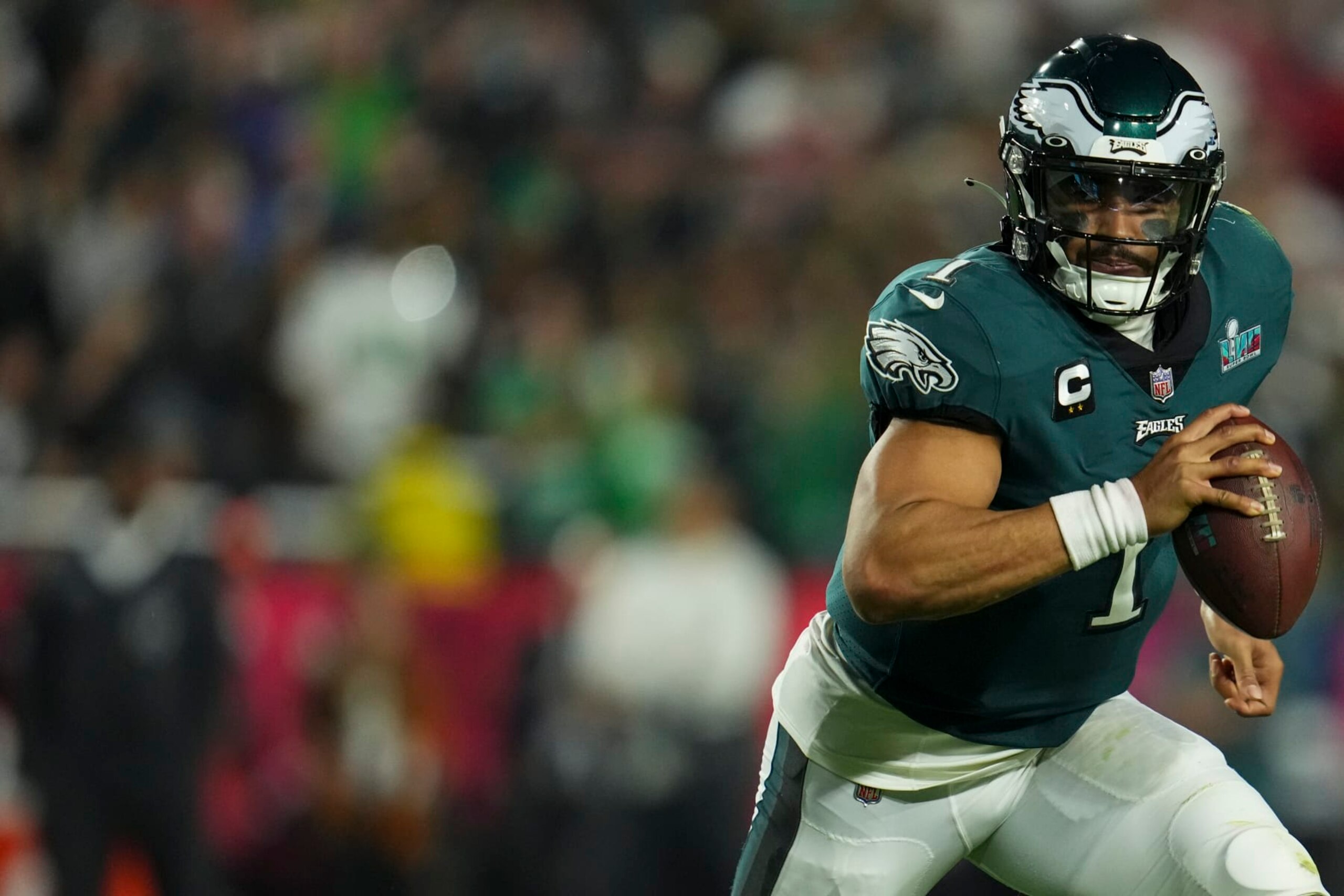 GLENDALE, AZ - FEBRUARY 12: Jalen Hurts #1 of the Philadelphia Eagles scrambles against the Kansas City Chiefs after Super Bowl LVII at State Farm Stadium on February 12, 2023 in Glendale, Arizona. The Chiefs defeated the Eagles 38-35. (Photo by Cooper Neill/Getty Images)