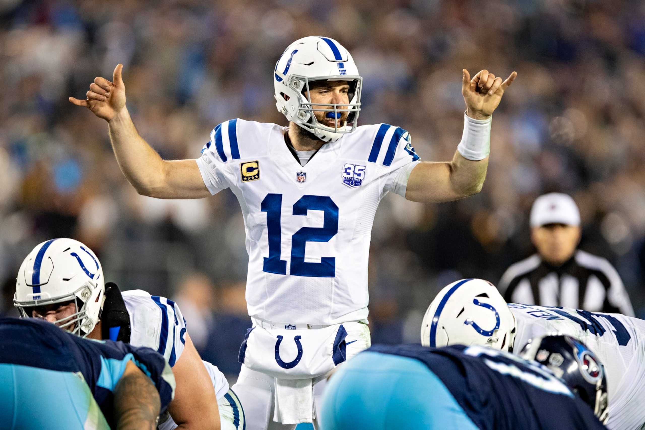NASHVILLE, TN - DECEMBER 30:  Andrew Luck #12 of the Indianapolis Colts signals at the line of scrimmage during a game against the Tennessee Titans at Nissan Stadium on December 30, 2018 in Nashville, Tennessee.  The Colts defeated the Titans 33-17.   (Photo by Wesley Hitt/Getty Images)