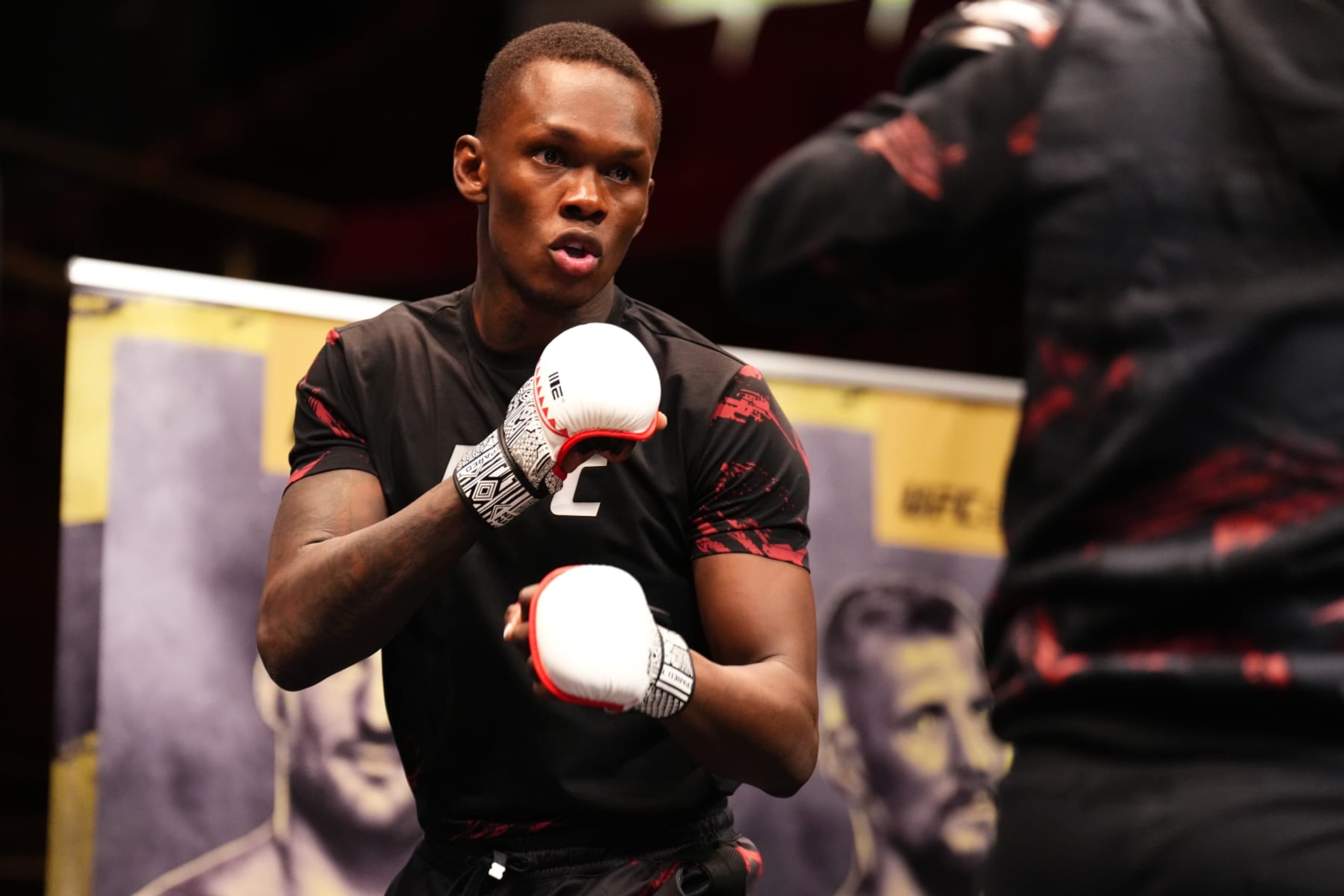 SYDNEY, AUSTRALIA - SEPTEMBER 06:  Israel Adesanya holds an open training session for fans and media during the UFC 293 Open Workouts at Sydney Town Hall on September 06, 2023 in Sydney, Australia. (Photo by Chris Unger/Zuffa LLC via Getty Images)