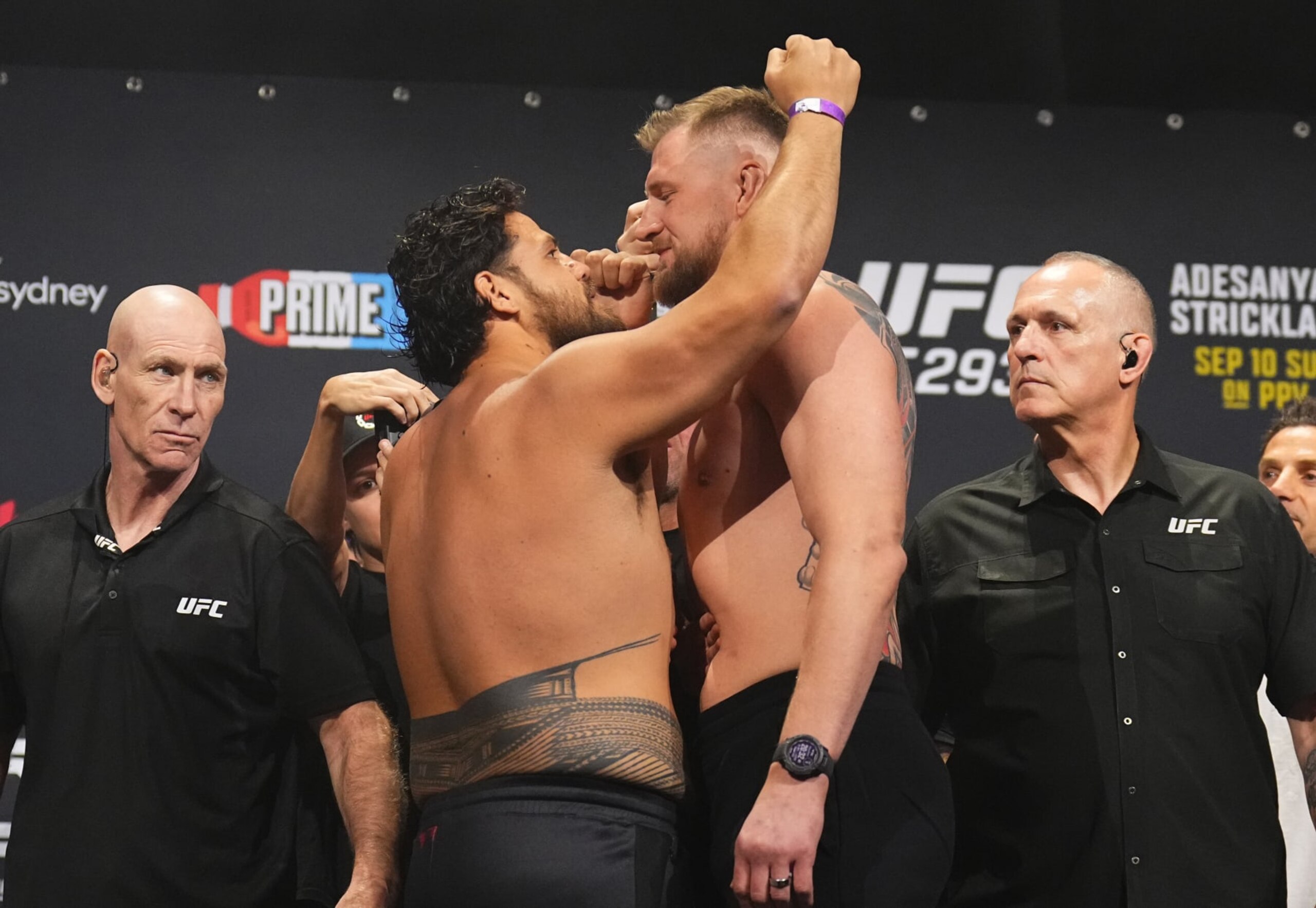 SYDNEY, AUSTRALIA - SEPTEMBER 08: (L-R) Opponents Tai Tuivasa of Australia and Alexander Volkov of Russia face off during the UFC 293 ceremonial weigh-in at Qudos Bank Arena on September 08, 2023 in Sydney, Australia. (Photo by Chris Unger/Zuffa LLC via Getty Images)