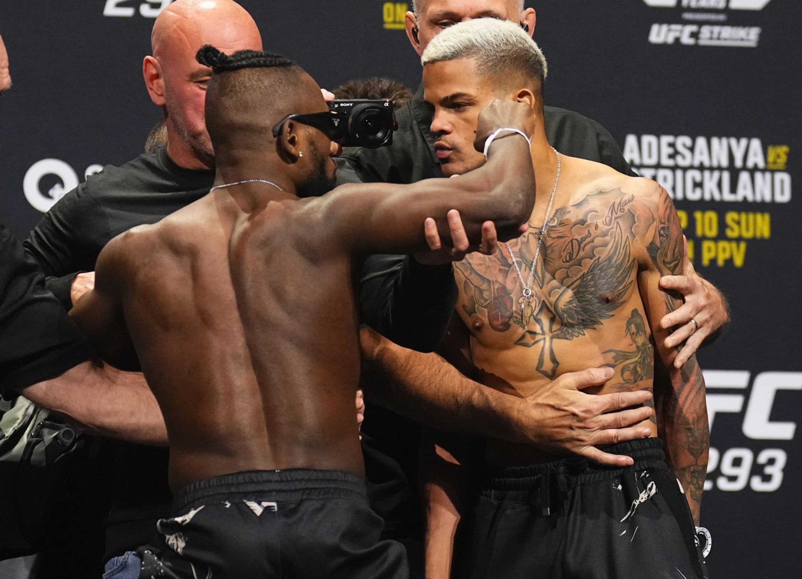 SYDNEY, AUSTRALIA - SEPTEMBER 08: (L-R) Opponents Manel Kape of Angola and Felipe dos Santos of Brazil face off during the UFC 293 ceremonial weigh-in at Qudos Bank Arena on September 08, 2023 in Sydney, Australia. (Photo by Chris Unger/Zuffa LLC via Getty Images)