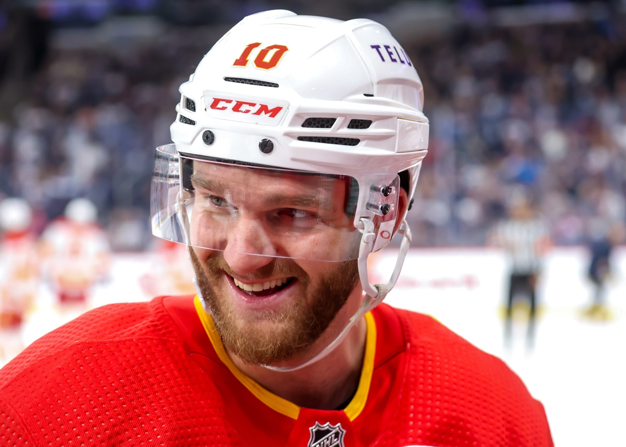 WINNIPEG, CANADA - APRIL 05: Jonathan Huberdeau #10 of the Calgary Flames looks on during a third period stoppage of play against the Winnipeg Jets at Canada Life Centre on April 05, 2023 in Winnipeg, Manitoba, Canada. (Photo by Jonathan Kozub/NHLI via Getty Images)