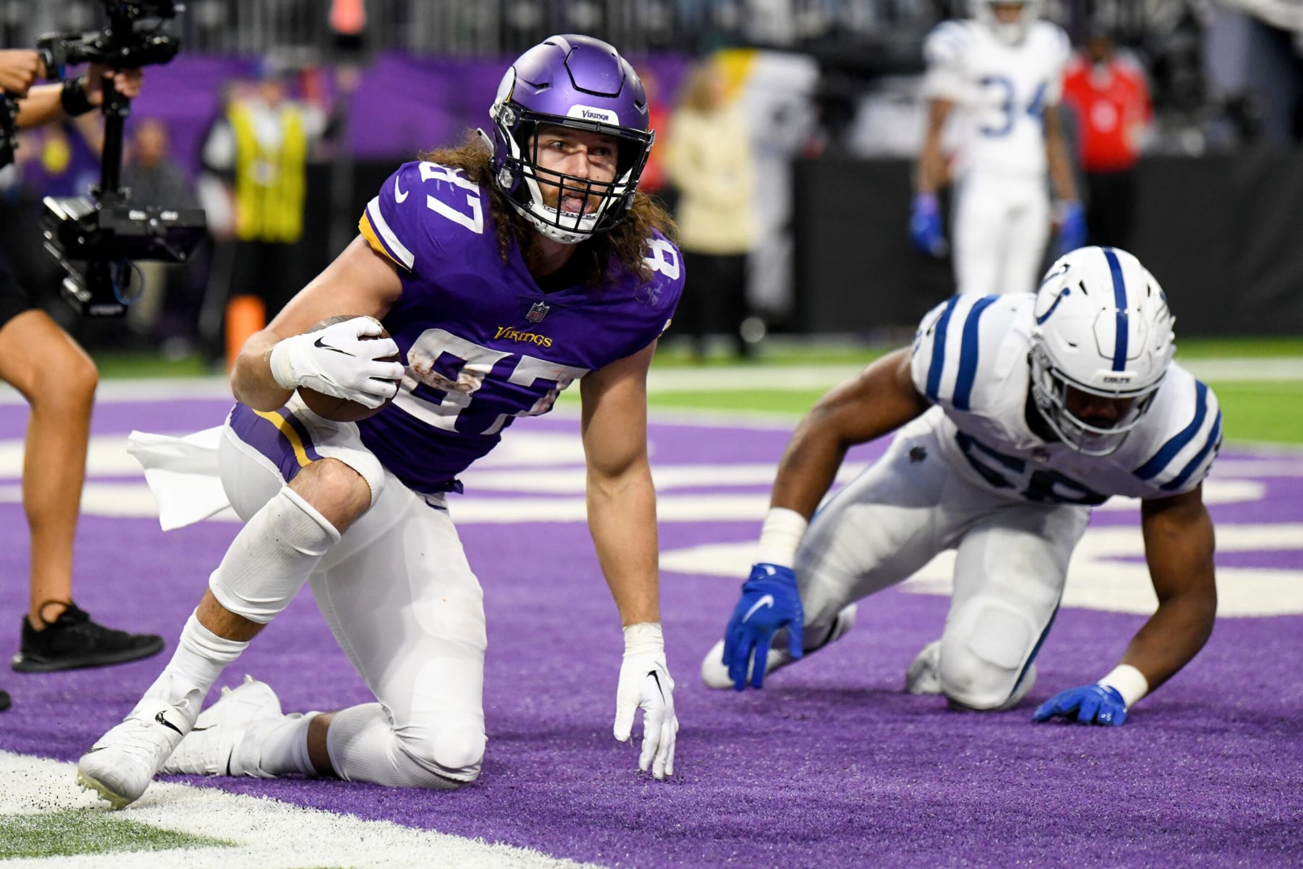 MINNEAPOLIS, MINNESOTA - DECEMBER 17: T.J. Hockenson #87 of the Minnesota Vikings catches a pass for a successful two point conversion against the Indianapolis Colts during the fourth quarter of the game at U.S. Bank Stadium on December 17, 2022 in Minneapolis, Minnesota. (Photo by Stephen Maturen/Getty Images) MINNEAPOLIS, MINNESOTA - DECEMBER 17: T.J. Hockenson #87 of the Minnesota Vikings catches a pass for a successful two point conversion against the Indianapolis Colts during the fourth quarter of the game at U.S. Bank Stadium on December 17, 2022 in Minneapolis, Minnesota. (Photo by Stephen Maturen/Getty Images)