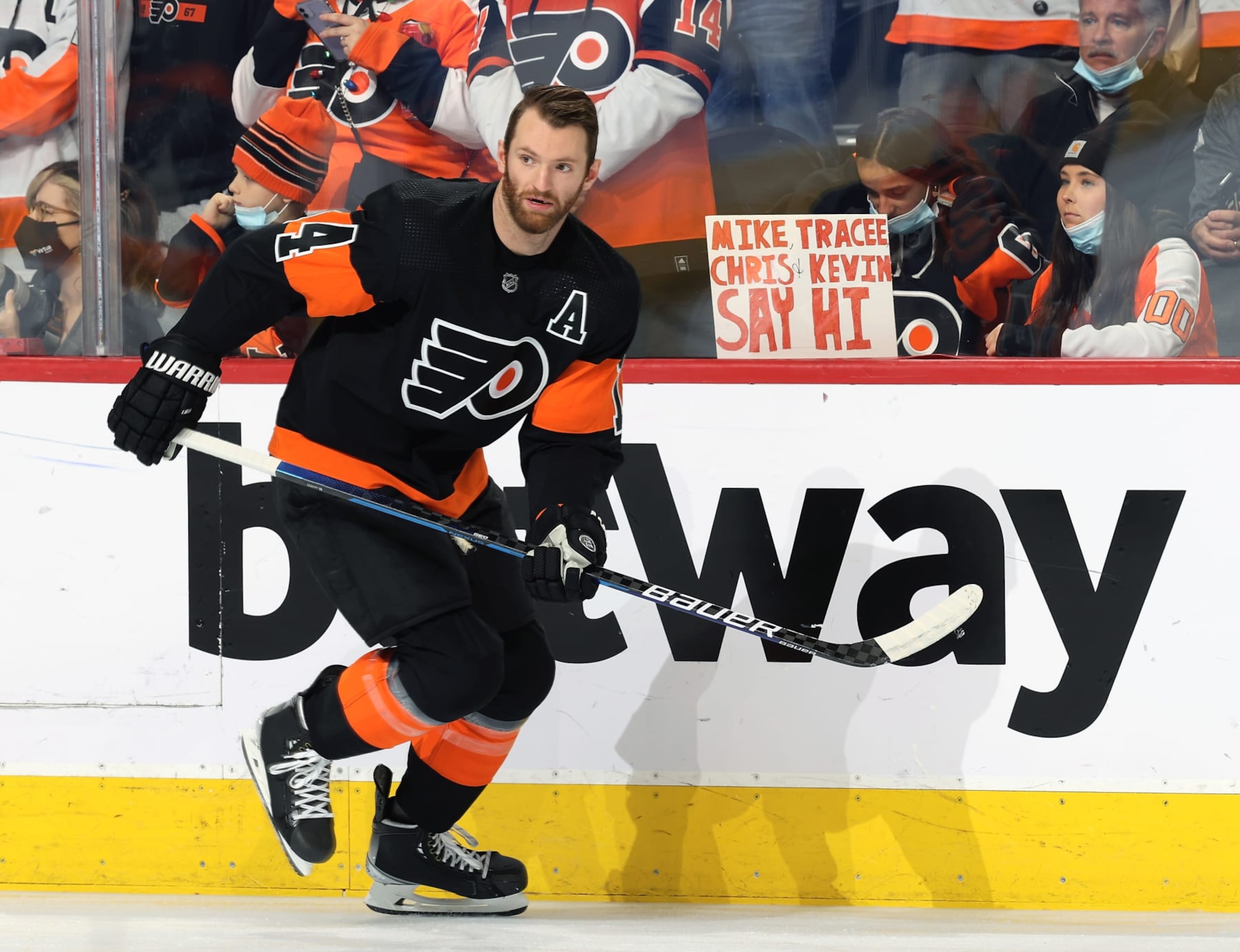 PHILADELPHIA, PA - DECEMBER 18:  Sean Couturier #14 of the Philadelphia Flyers skates during warm-ups against the Ottawa Senators at the Wells Fargo Center on December 18, 2021 in Philadelphia, Pennsylvania.  (Photo by Len Redkoles/NHLI via Getty Images)