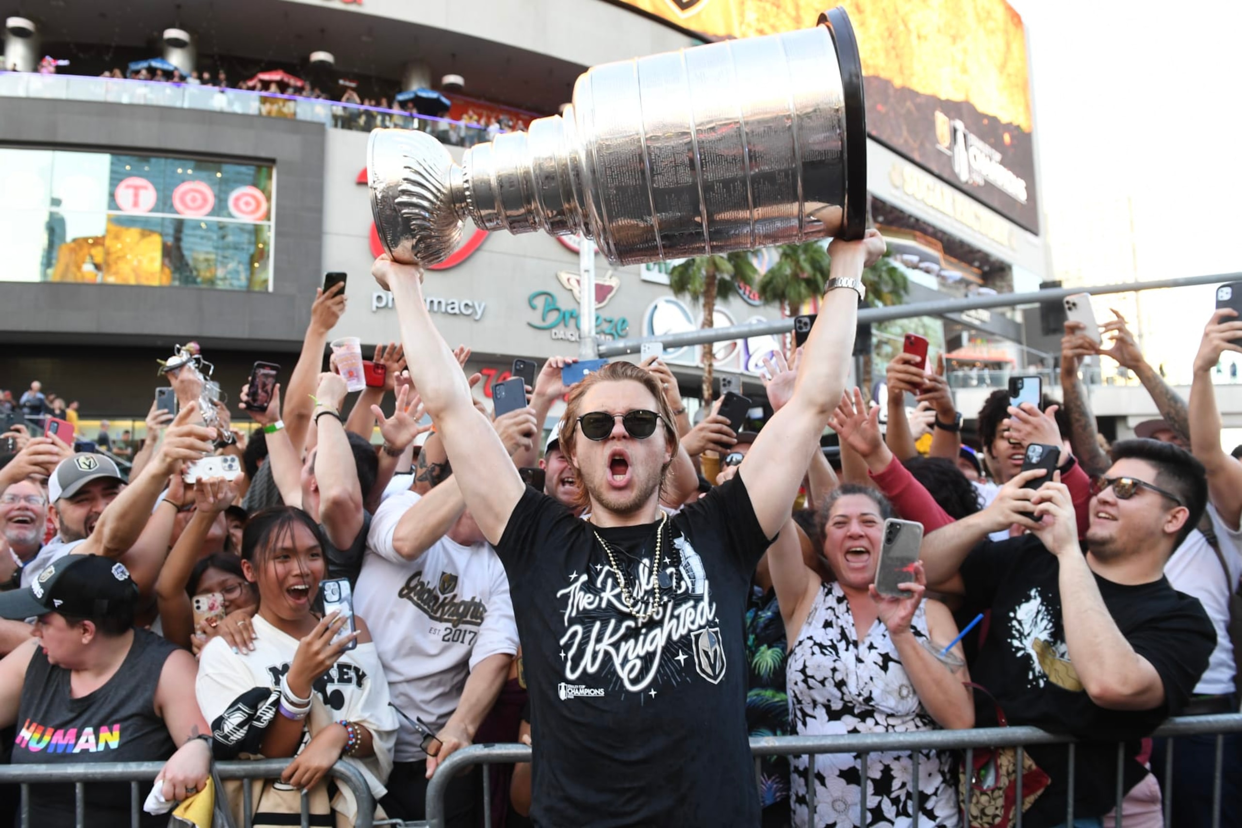 LAS VEGAS, NEVADA - JUNE 17: William Karlsson #71 of the Vegas Golden Knights hoists the Stanley Cup during a victory parade and rally for the Vegas Golden Knights on the Las Vegas Strip on June 17, 2023 in Las Vegas, Nevada. The Golden Knights defeated the Florida Panthers four games to one to win the 2023 NHL Stanley Cup Final. (Photo by Candice Ward/Getty Images)