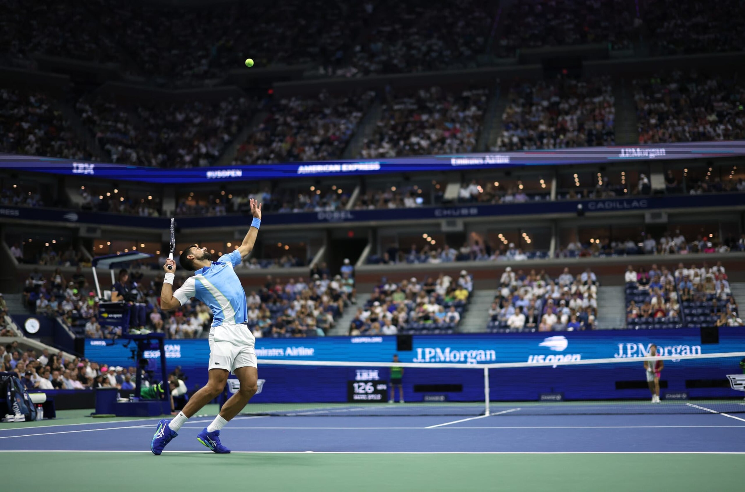 NEW YORK, NEW YORK - SEPTEMBER 08: Novak Djokovic of Serbia serves against Ben Shelton of the United States during their Men's Singles Semifinal match on Day Twelve of the 2023 US Open at the USTA Billie Jean King National Tennis Center on September 08, 2023 in the Flushing neighborhood of the Queens borough of New York City. (Photo by Mike Stobe/Getty Images)