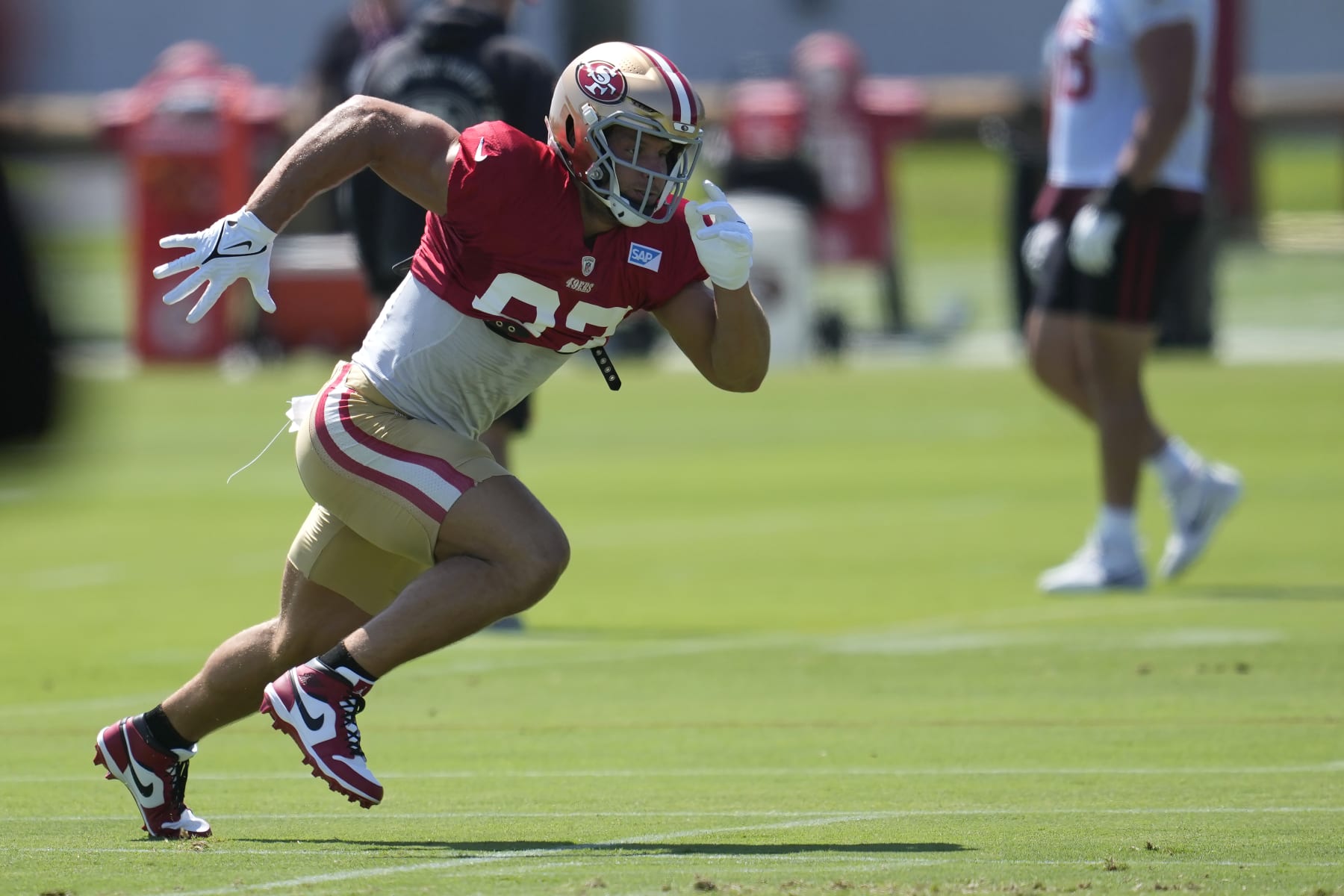 San Francisco 49ers defensive end Nick Bosa runs during an NFL football practice in Santa Clara, Calif., Thursday, Sept. 7, 2023. (AP Photo/Jeff Chiu)