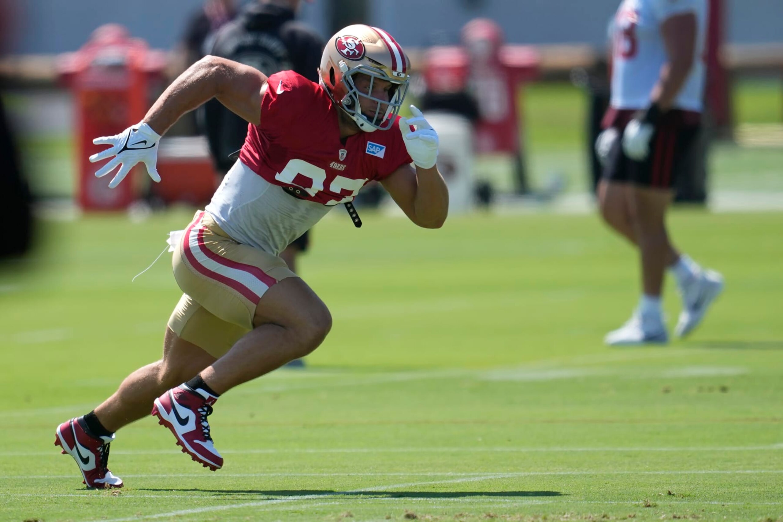 San Francisco 49ers defensive end Nick Bosa runs during an NFL football practice in Santa Clara, Calif., Thursday, Sept. 7, 2023. (AP Photo/Jeff Chiu)