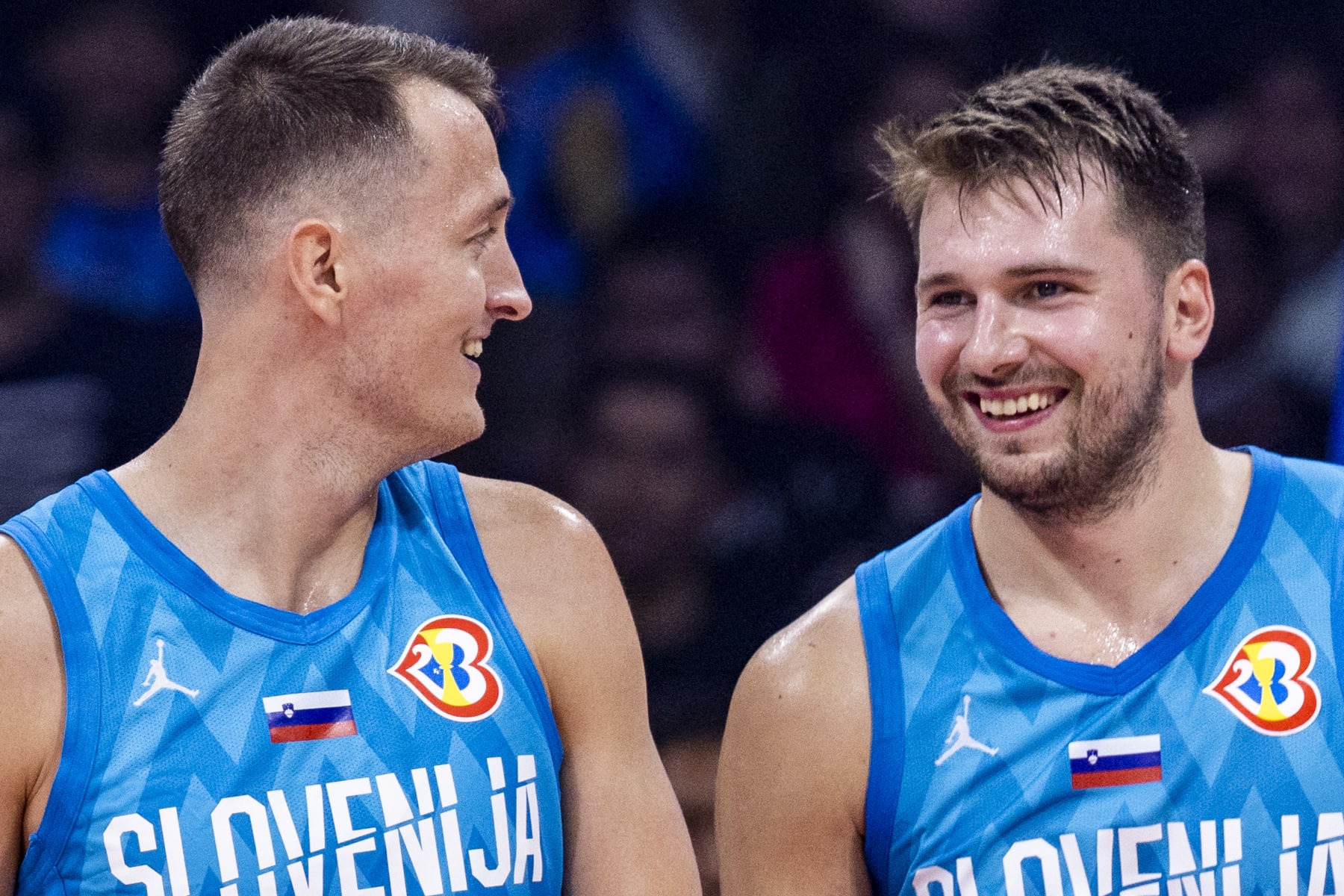 MANILA, PHILIPPINES - SEPTEMBER 09: Jakob Cebasek #55 and Luka Doncic #77 of Slovenia in action during the FIBA Basketball World Cup Classification 7-8 game between Italy and Slovenia at Mall of Asia Arena on September 09, 2023 in Manila, Philippines. (Photo by Ezra Acayan/Getty Images)
