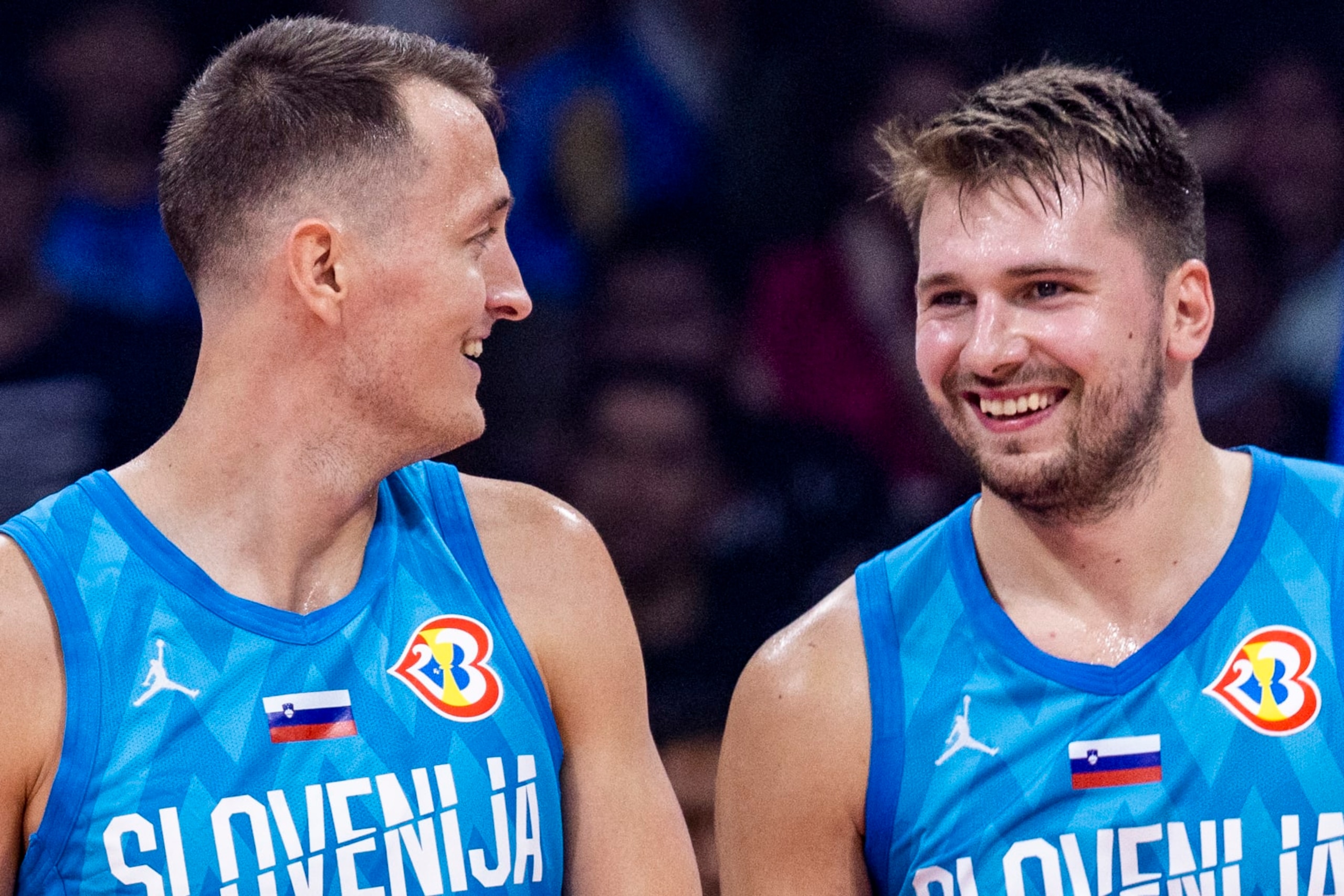 MANILA, PHILIPPINES - SEPTEMBER 09: Jakob Cebasek #55 and Luka Doncic #77 of Slovenia in action during the FIBA Basketball World Cup Classification 7-8 game between Italy and Slovenia at Mall of Asia Arena on September 09, 2023 in Manila, Philippines. (Photo by Ezra Acayan/Getty Images) MANILA, PHILIPPINES - SEPTEMBER 09: Jakob Cebasek #55 and Luka Doncic #77 of Slovenia in action during the FIBA Basketball World Cup Classification 7-8 game between Italy and Slovenia at Mall of Asia Arena on September 09, 2023 in Manila, Philippines. (Photo by Ezra Acayan/Getty Images)