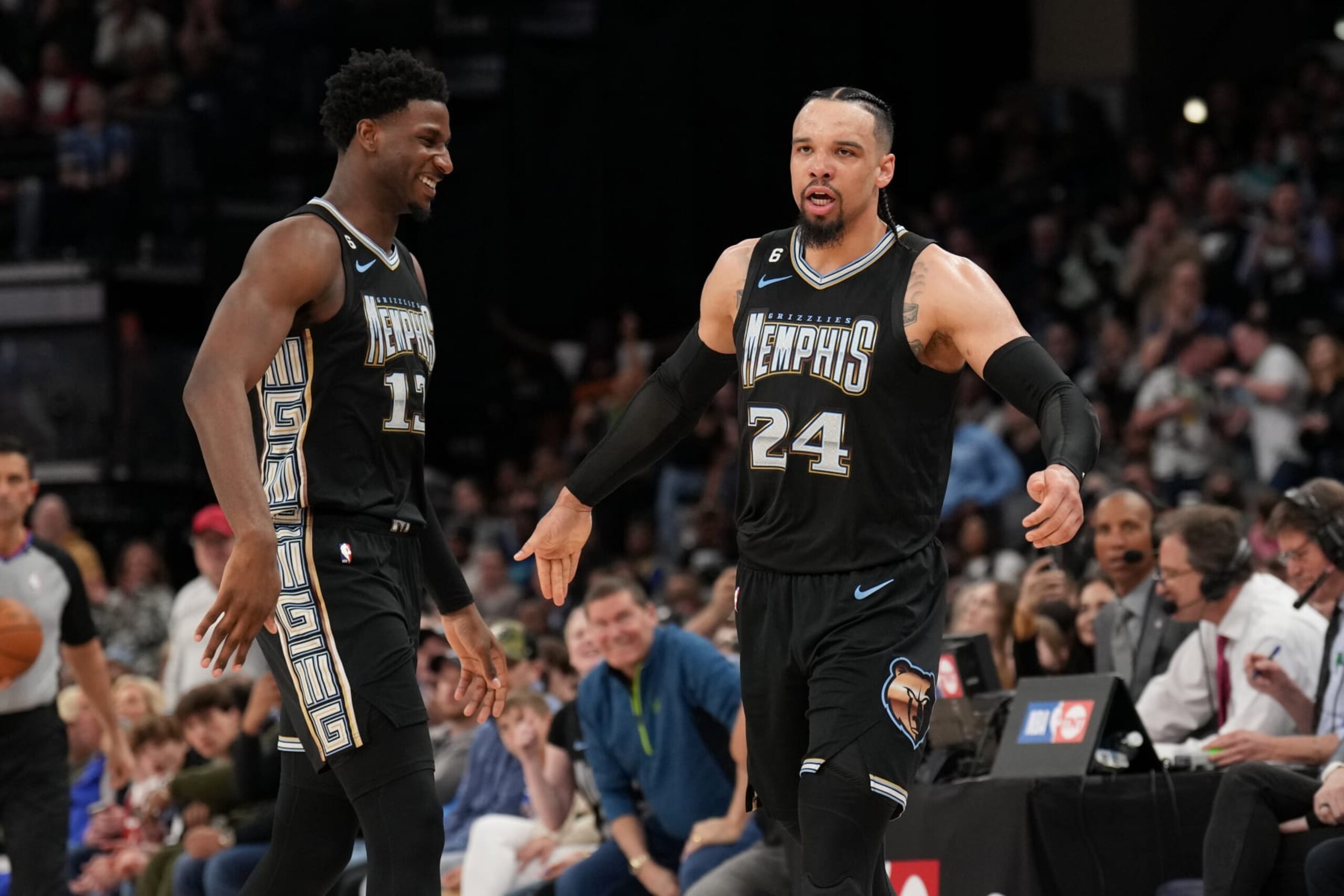 MEMPHIS, TN - MARCH 9: Dillon Brooks #24 of the Memphis Grizzlies high fives Jaren Jackson Jr. #13 of the Memphis Grizzlies during the game against the Golden State Warriors on March 9, 2023 at FedExForum in Memphis, Tennessee. NOTE TO USER: User expressly acknowledges and agrees that, by downloading and or using this photograph, User is consenting to the terms and conditions of the Getty Images License Agreement. Mandatory Copyright Notice: Copyright 2023 NBAE (Photo by Jesse D. Garrabrant/NBAE via Getty Images)