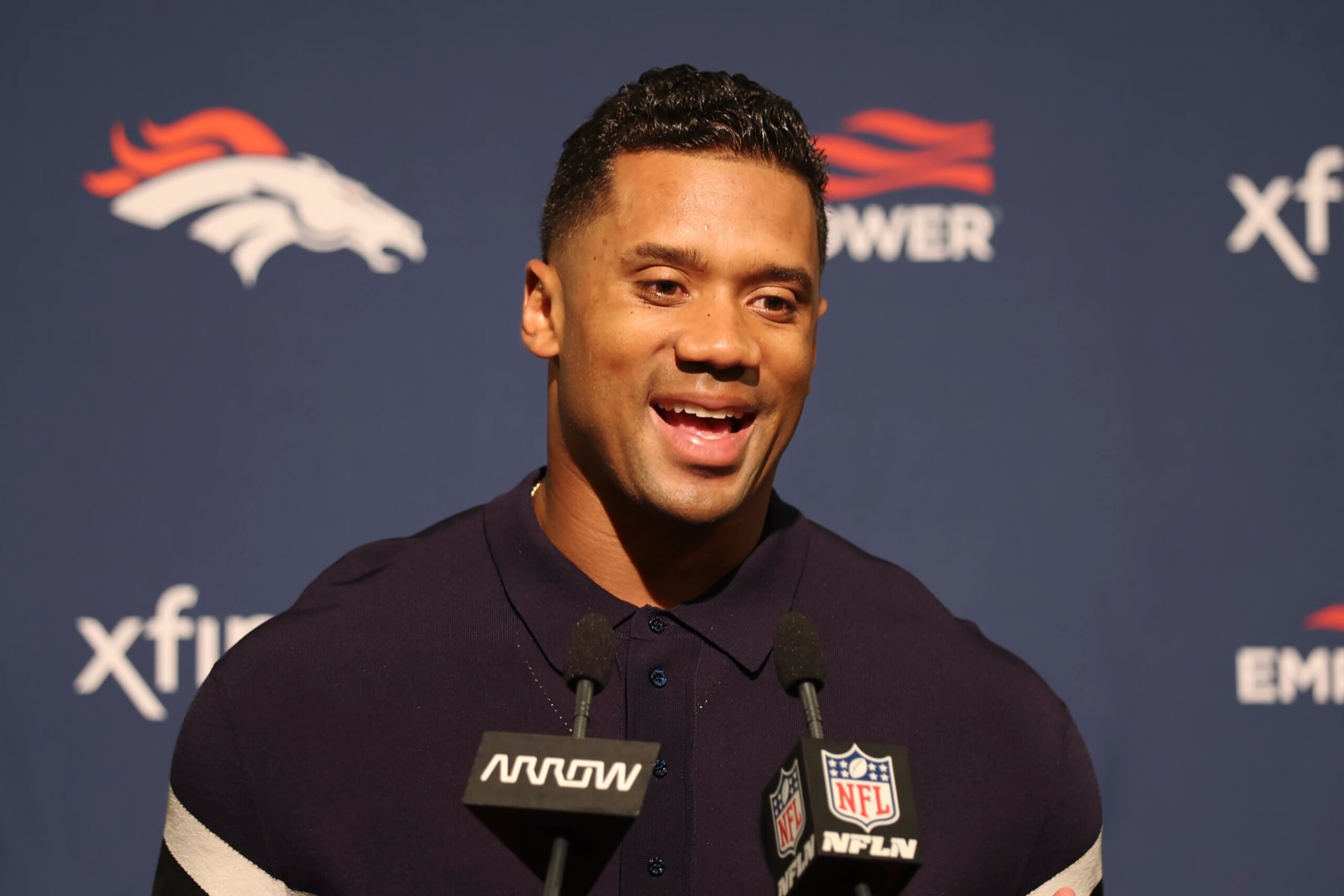 Denver Broncos quarterback Russell Wilson speaks to reporters after an NFL preseason football game against the San Francisco 49ers in Santa Clara, Calif., Saturday, Aug. 19, 2023. (AP Photo/Jed Jacobsohn)