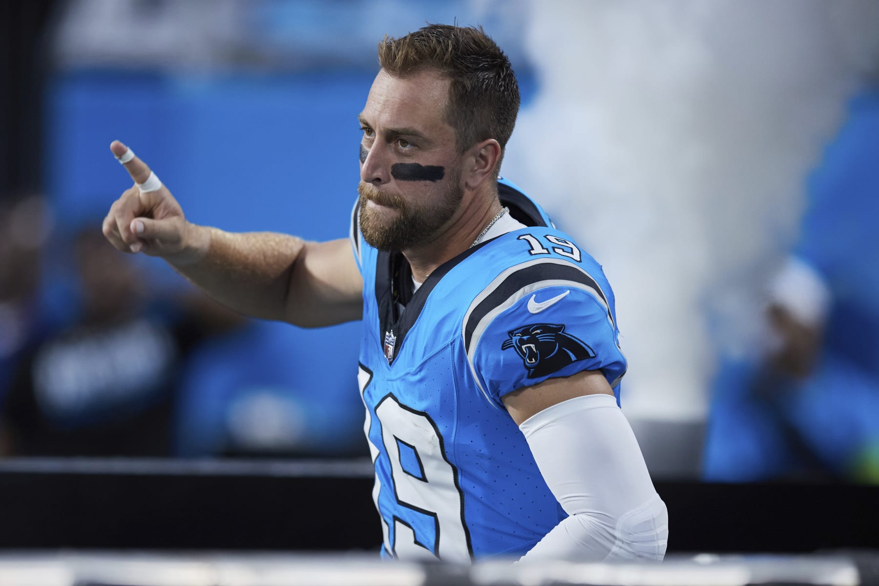 Carolina Panthers wide receiver Adam Thielen (19) takes the field during player introductions prior to an NFL preseason football game against the Detroit Lions, Friday, Aug. 25, 2023, in Charlotte, N.C. (AP Photo/Brian Westerholt)