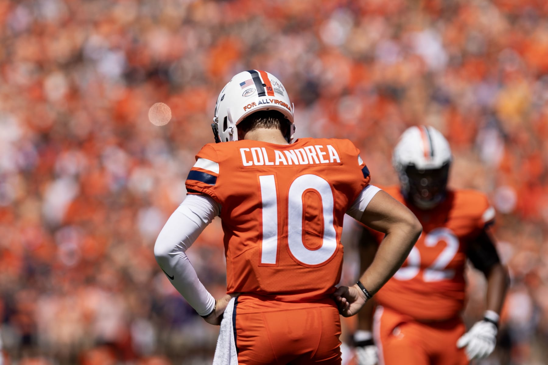 CHARLOTTESVILLE, VIRGINIA - SEPTEMBER 9: Anthony Colandrea #10 of the Virginia Cavaliers rects to a play in the first half during a game against the James Madison Dukes at Scott Stadium on September 9, 2023 in Charlottesville, Virginia. (Photo by Ryan M. Kelly/Getty Images)
