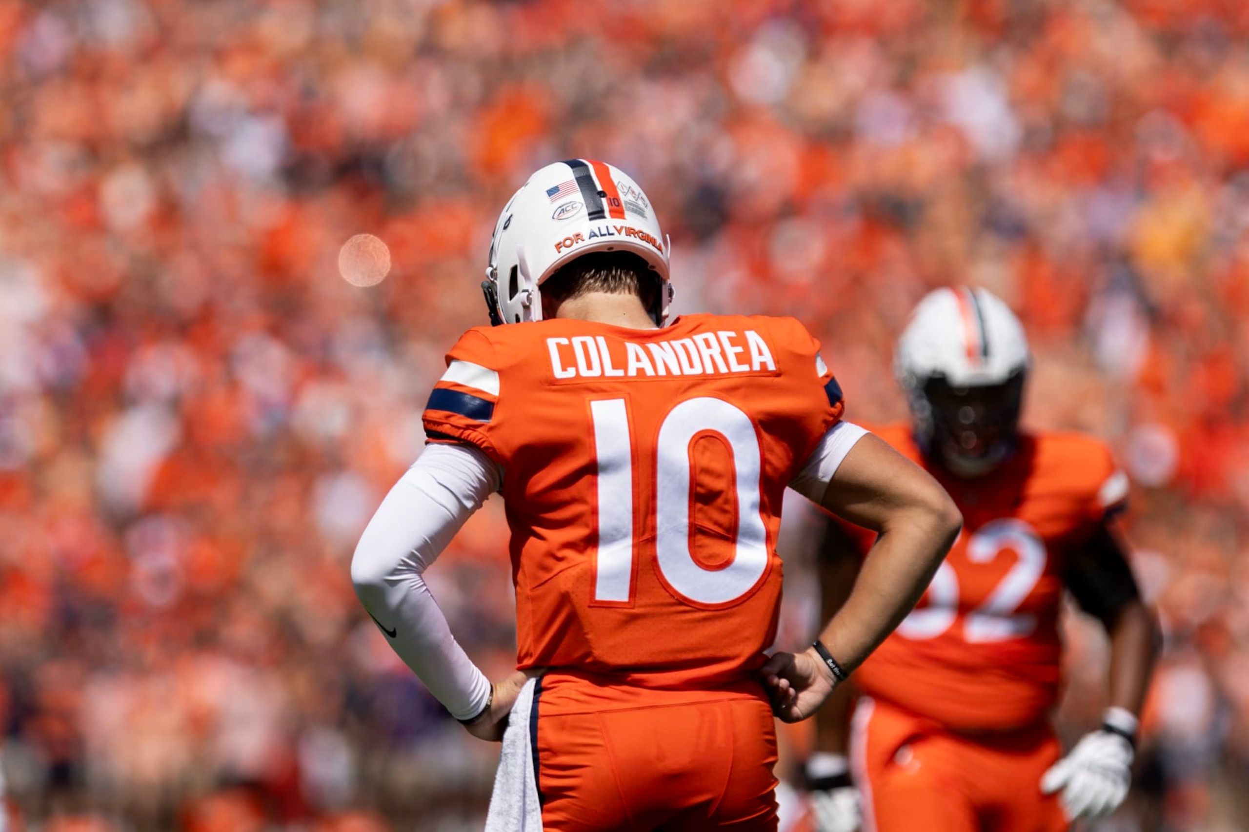 CHARLOTTESVILLE, VIRGINIA - SEPTEMBER 9: Anthony Colandrea #10 of the Virginia Cavaliers rects to a play in the first half during a game against the James Madison Dukes at Scott Stadium on September 9, 2023 in Charlottesville, Virginia. (Photo by Ryan M. Kelly/Getty Images)