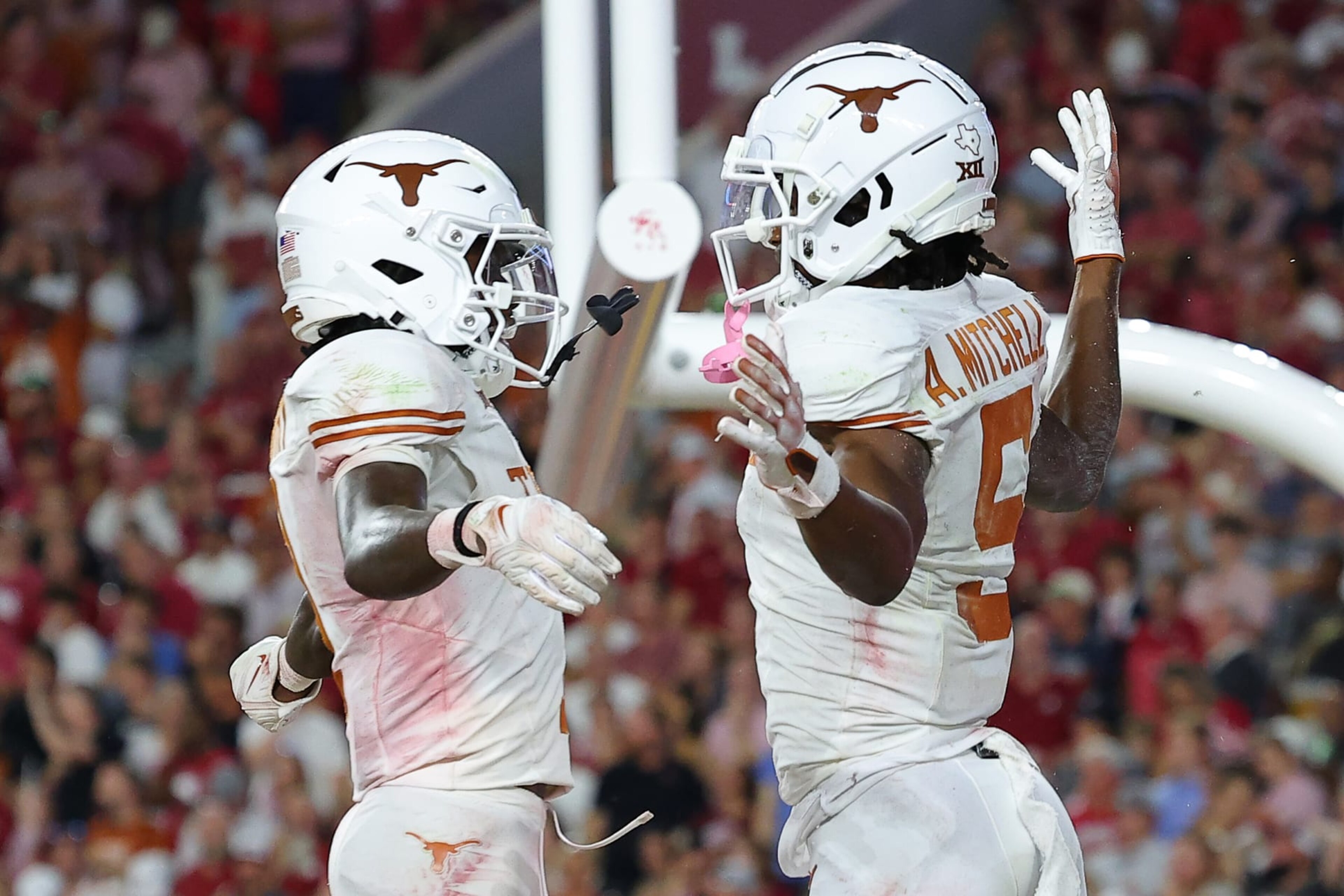 TUSCALOOSA, ALABAMA - SEPTEMBER 09: Adonai Mitchell #5 of the Texas Longhorns celebrates his touchdown catch with Xavier Worthy #1 during the fourth quarter against the Alabama Crimson Tide at Bryant-Denny Stadium on September 09, 2023 in Tuscaloosa, Alabama. (Photo by Kevin C. Cox/Getty Images)