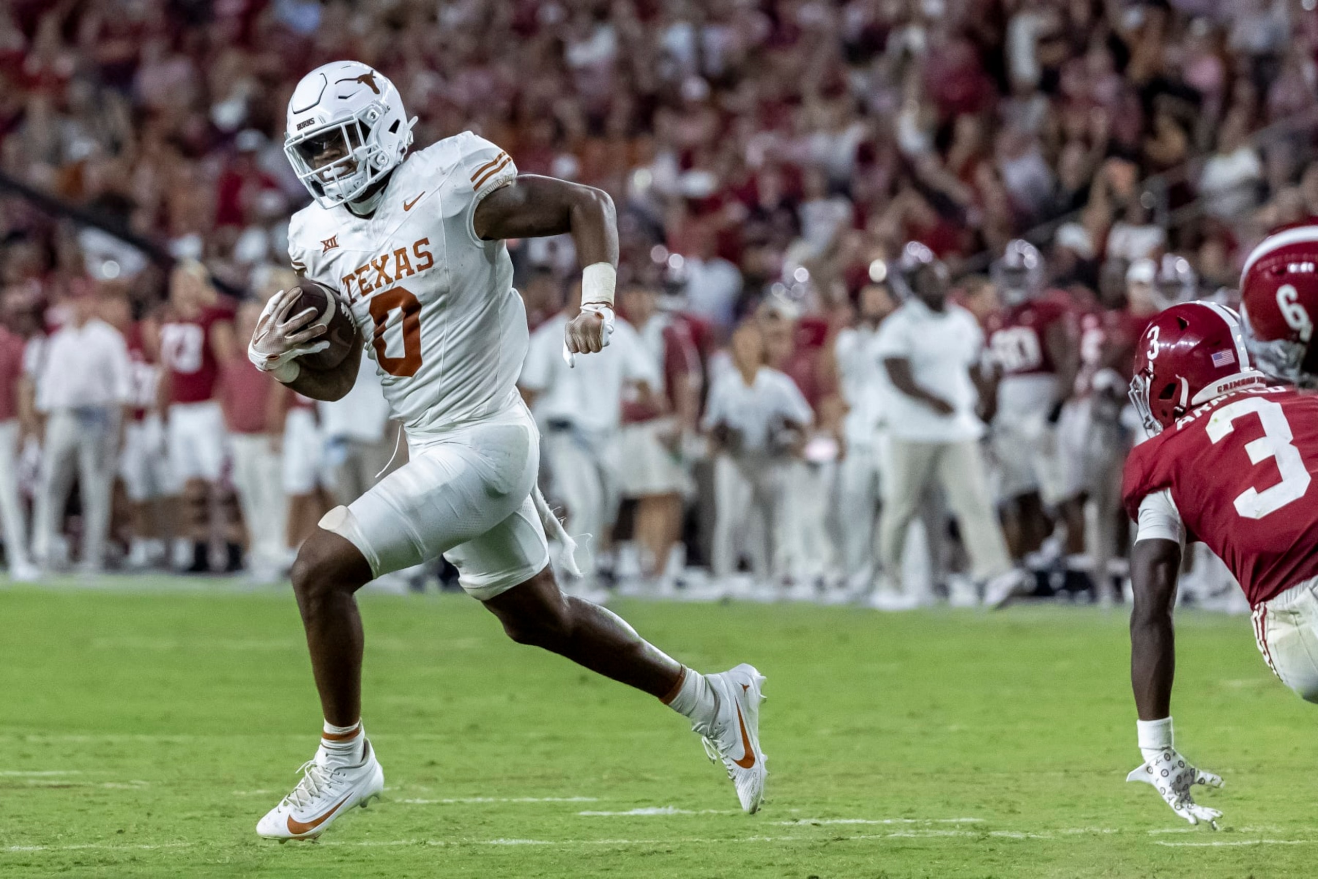Texas tight end Ja'Tavion Sanders (0) gets loose for a long gain against Alabama during the second half of an NCAA college football game, Saturday, Sept. 9, 2023, in Tuscaloosa, Ala. (AP Photo/Vasha Hunt) Texas tight end Ja'Tavion Sanders (0) gets loose for a long gain against Alabama during the second half of an NCAA college football game, Saturday, Sept. 9, 2023, in Tuscaloosa, Ala. (AP Photo/Vasha Hunt)
