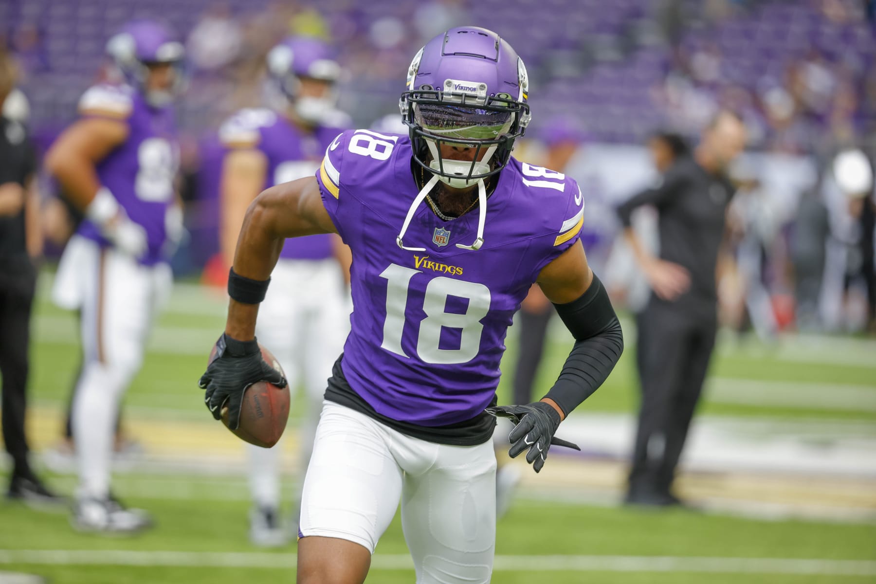 Minnesota Vikings wide receiver Justin Jefferson (18) warms up prior to an NFL preseason football game against the Arizona Cardinals, Saturday, Aug. 26, 2023, in Minneapolis. (AP Photo/Bruce Kluckhohn)