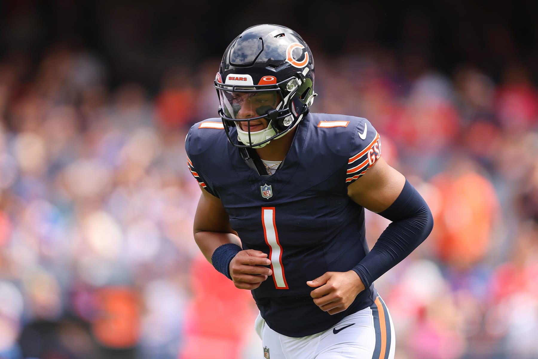 CHICAGO, ILLINOIS - AUGUST 26: Justin Fields #1 of the Chicago Bears looks on against the Buffalo Bills during the first half of a preseason game at Soldier Field on August 26, 2023 in Chicago, Illinois. (Photo by Michael Reaves/Getty Images)