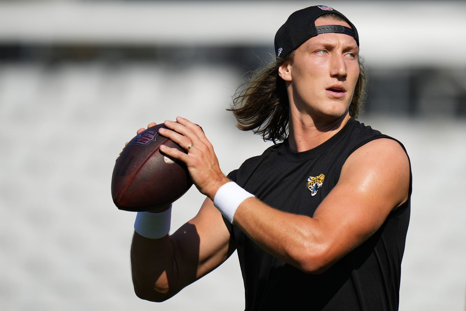 JACKSONVILLE, FLORIDA - AUGUST 26: Trevor Lawrence #16 of the Jacksonville Jaguars warms up prior to a preseason game against the Miami Dolphins at TIAA Bank Field on August 26, 2023 in Jacksonville, Florida. (Photo by Rich Storry/Getty Images)