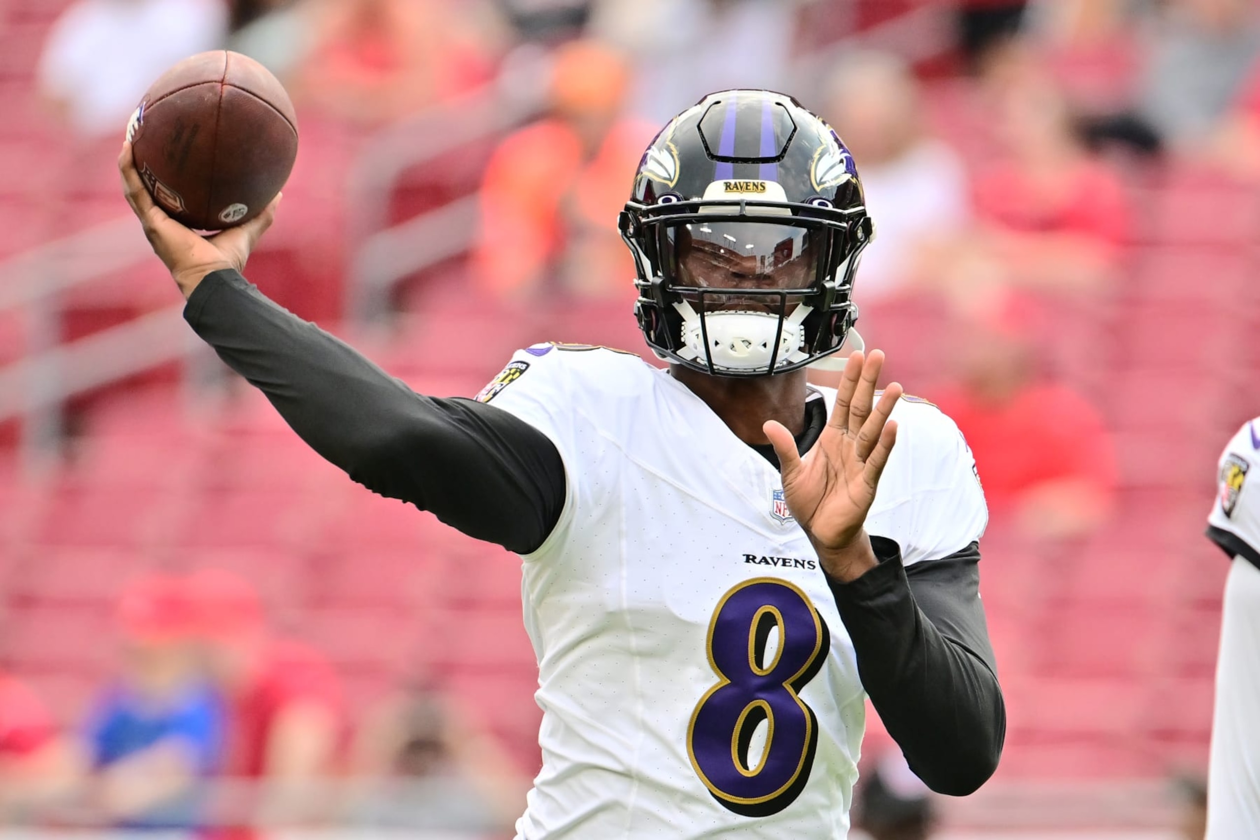 TAMPA, FLORIDA - AUGUST 26: Lamar Jackson #8 of the Baltimore Ravens warms up prior to a preseason game against the Tampa Bay Buccaneers at Raymond James Stadium on August 26, 2023 in Tampa, Florida. (Photo by Julio Aguilar/Getty Images) TAMPA, FLORIDA - AUGUST 26: Lamar Jackson #8 of the Baltimore Ravens warms up prior to a preseason game against the Tampa Bay Buccaneers at Raymond James Stadium on August 26, 2023 in Tampa, Florida. (Photo by Julio Aguilar/Getty Images)
