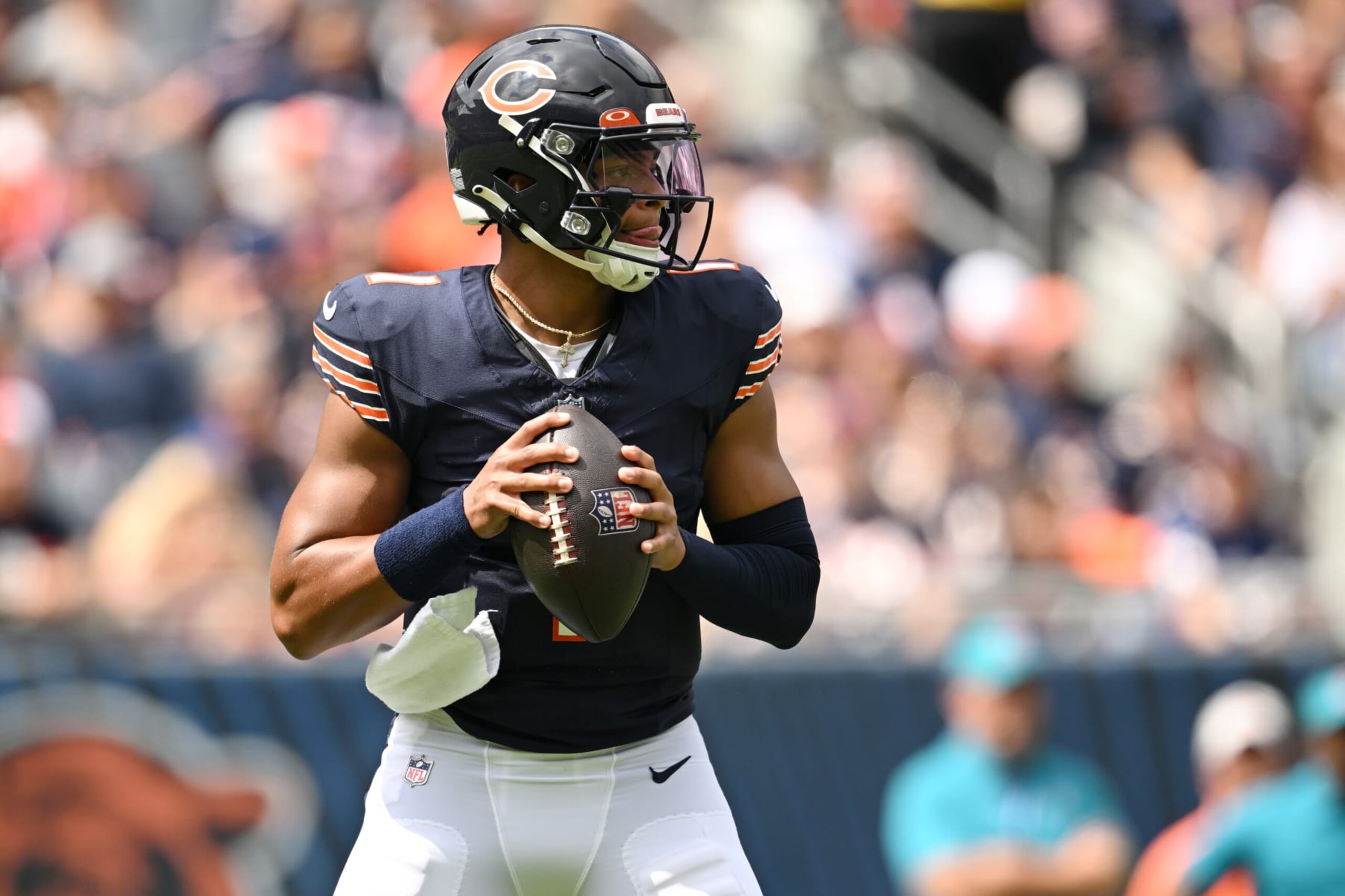 CHICAGO, ILLINOIS - AUGUST 26: Justin Fields #1 of the Chicago Bears looks to pass the ball in the first of a preseason game against the Buffalo Bills at Soldier Field on August 26, 2023 in Chicago, Illinois. (Photo by Quinn Harris/Getty Images) CHICAGO, ILLINOIS - AUGUST 26: Justin Fields #1 of the Chicago Bears looks to pass the ball in the first of a preseason game against the Buffalo Bills at Soldier Field on August 26, 2023 in Chicago, Illinois. (Photo by Quinn Harris/Getty Images)