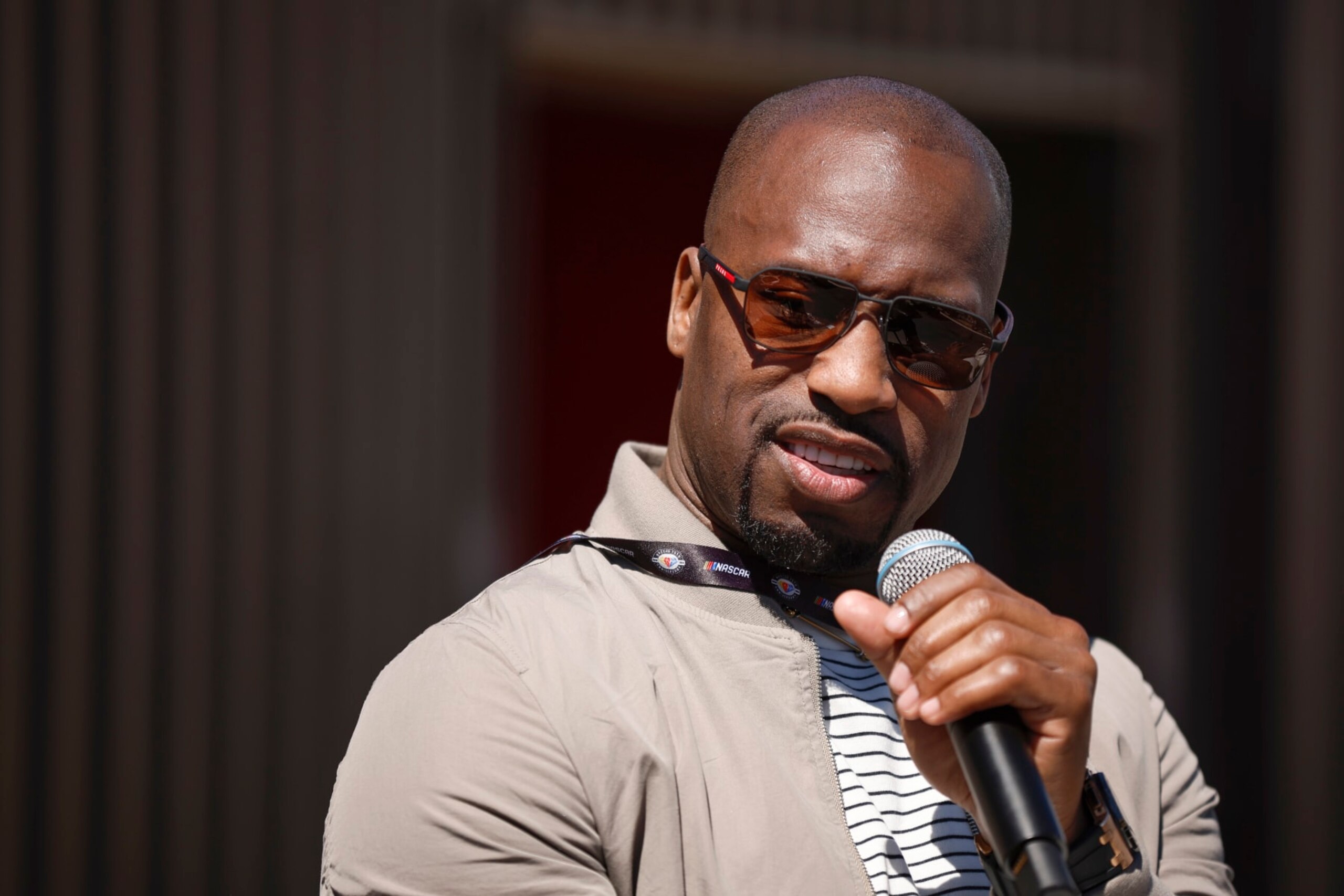 RICHMOND, VIRGINIA - APRIL 02: Former NFL player Vernon Davis and honorary pace car driver speaks during an interview at the Fan Grounds prior to the NASCAR Cup Series Toyota Owners 400 at Richmond Raceway on April 02, 2023 in Richmond, Virginia. (Photo by Jared C. Tilton/Getty Images) RICHMOND, VIRGINIA - APRIL 02: Former NFL player Vernon Davis and honorary pace car driver speaks during an interview at the Fan Grounds prior to the NASCAR Cup Series Toyota Owners 400 at Richmond Raceway on April 02, 2023 in Richmond, Virginia. (Photo by Jared C. Tilton/Getty Images)