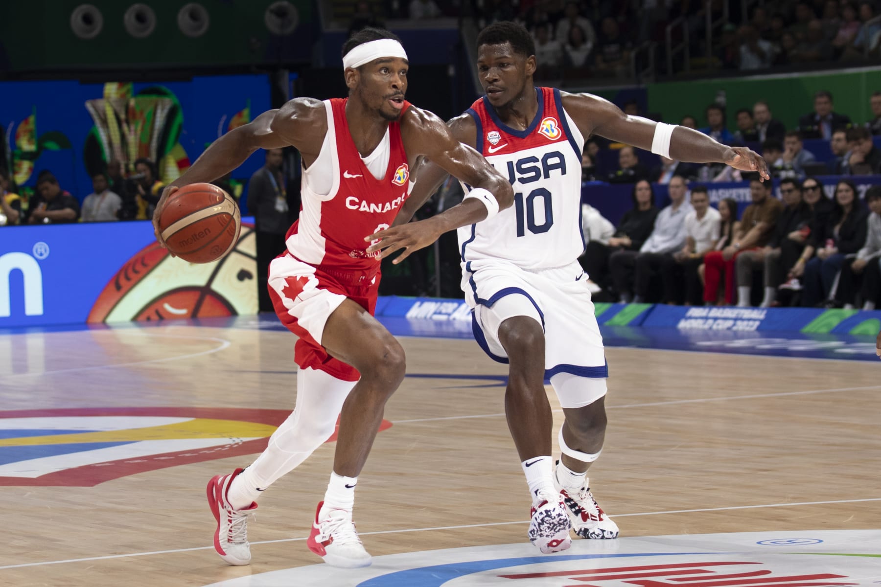 MANILA, PHILIPPINES - SEPTEMBER 10: Anthony Edwards of USA and Shai Gilgeous-Alexander of Canada during the FIBA Basketball World Cup 3rd Place game between USA and Canada at Mall of Asia Arena on September 10, 2023 in Manila, Philippines. (Photo by Ariana Saigh/Getty Images)