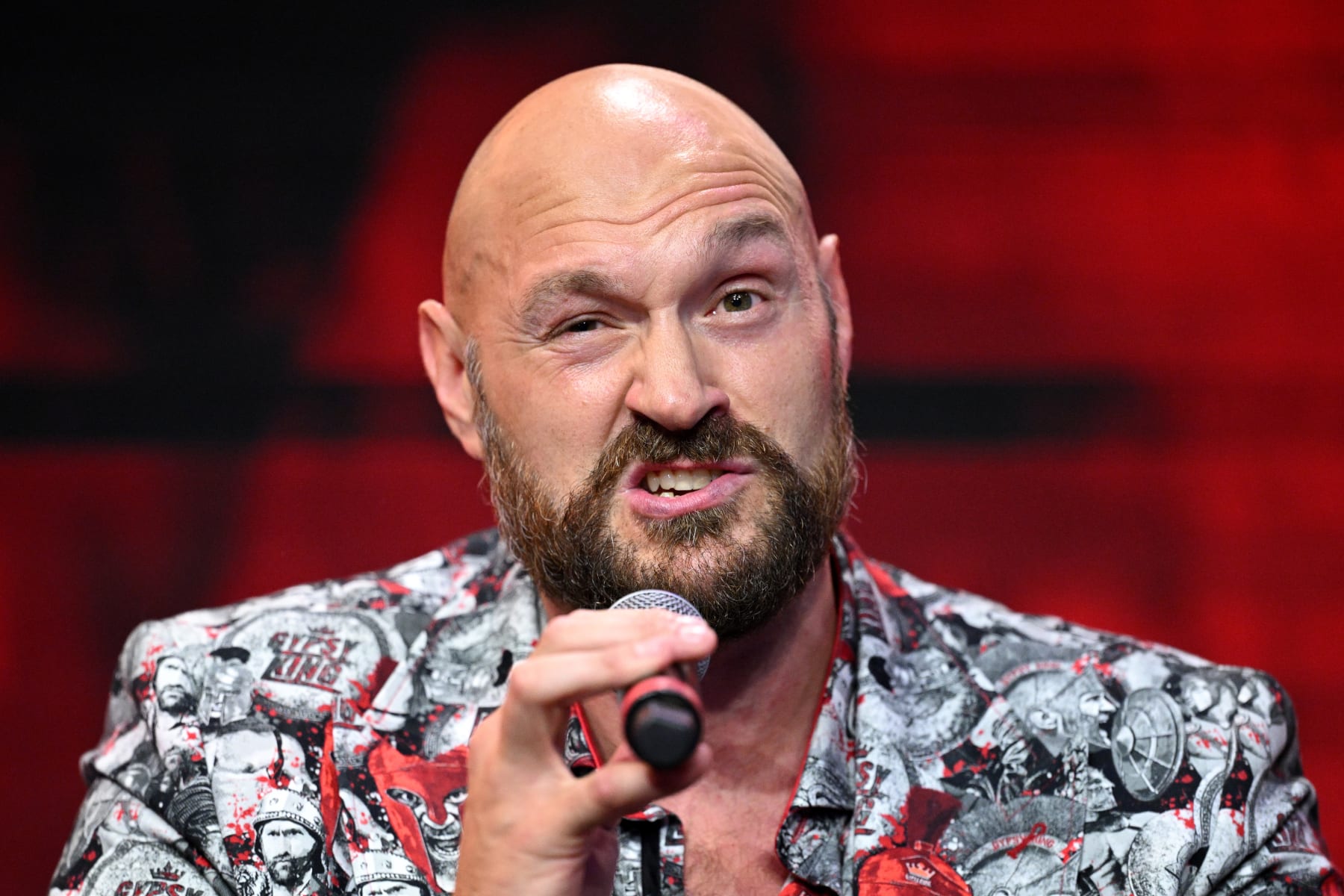 LONDON, ENGLAND - SEPTEMBER 07: Tyson Fury speaks during a Tyson Fury v Francis Ngannou Press Conference at HERE on September 07, 2023 in London, England. (Photo by Justin Setterfield/Getty Images)