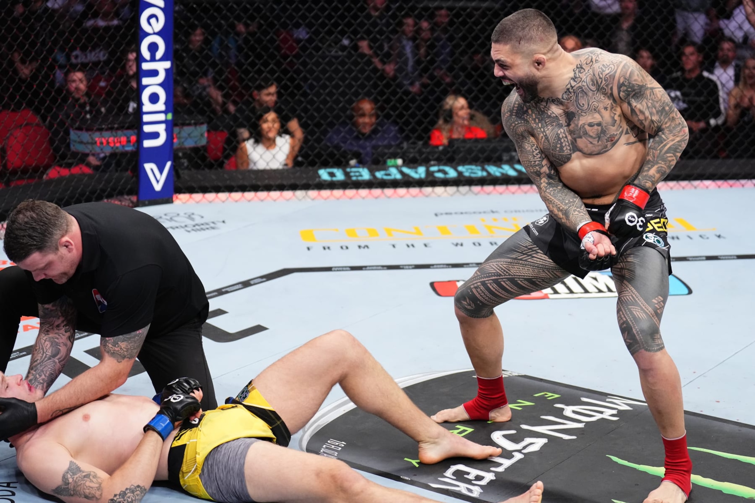 SYDNEY, AUSTRALIA - SEPTEMBER 10: Tyson Pedro of Australia reacts after his knockout victory over Anton Turkalj of Sweden in a light heavyweight fight during the UFC 293 event at Qudos Bank Arena on September 10, 2023 in Sydney, Australia. (Photo by Chris Unger/Zuffa LLC via Getty Images)