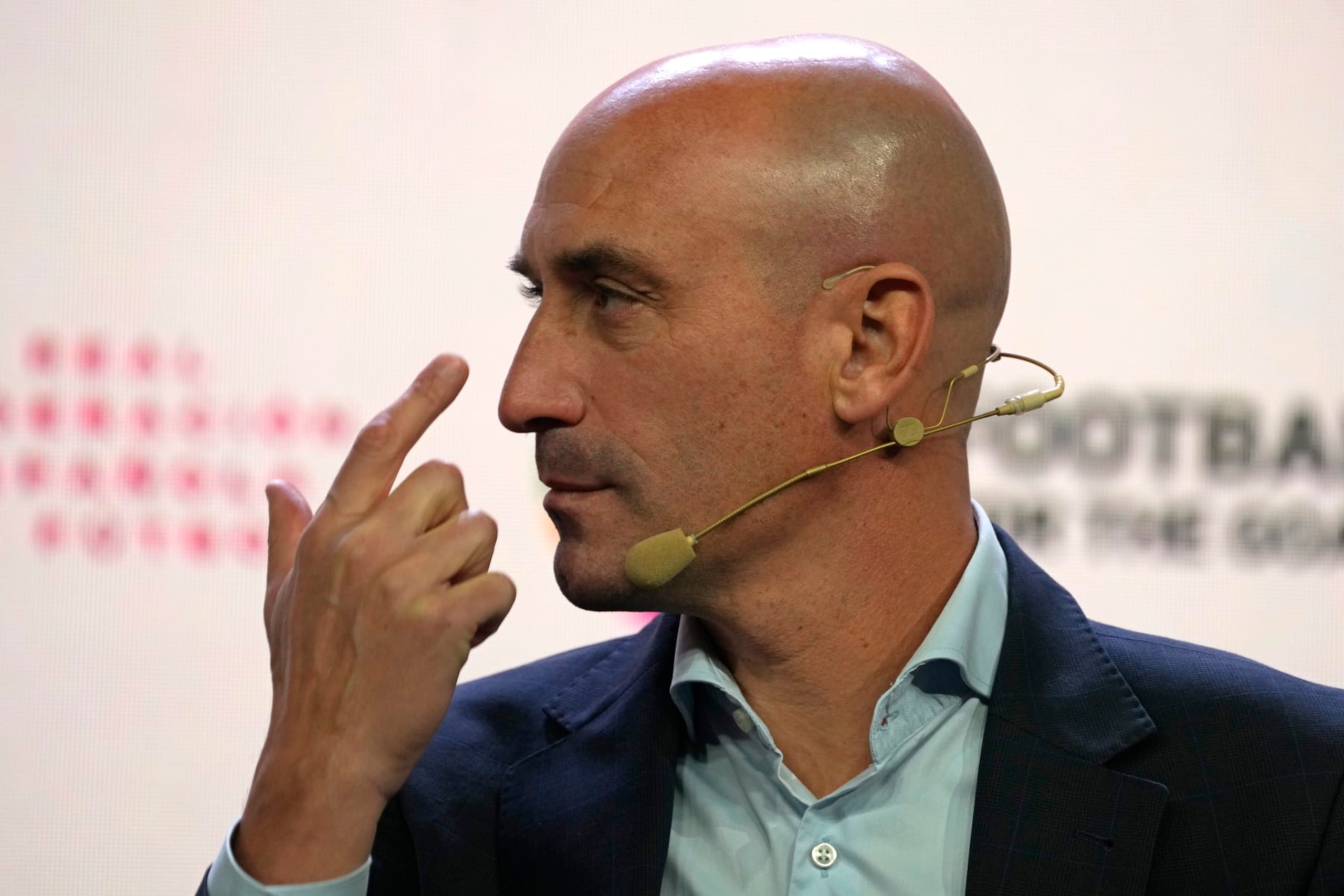 The President of the Spanish Football Federation Luis Rubiales gestures during a conference by the Spanish Football Federation on human rights and sustainability in Las Rozas, just outside Madrid, Spain, Tuesday, Nov. 15, 2022. The national soccer team will travel to Jordan for a friendly match and then onto Qatar to participate in the World Cup. (AP Photo/Paul White)