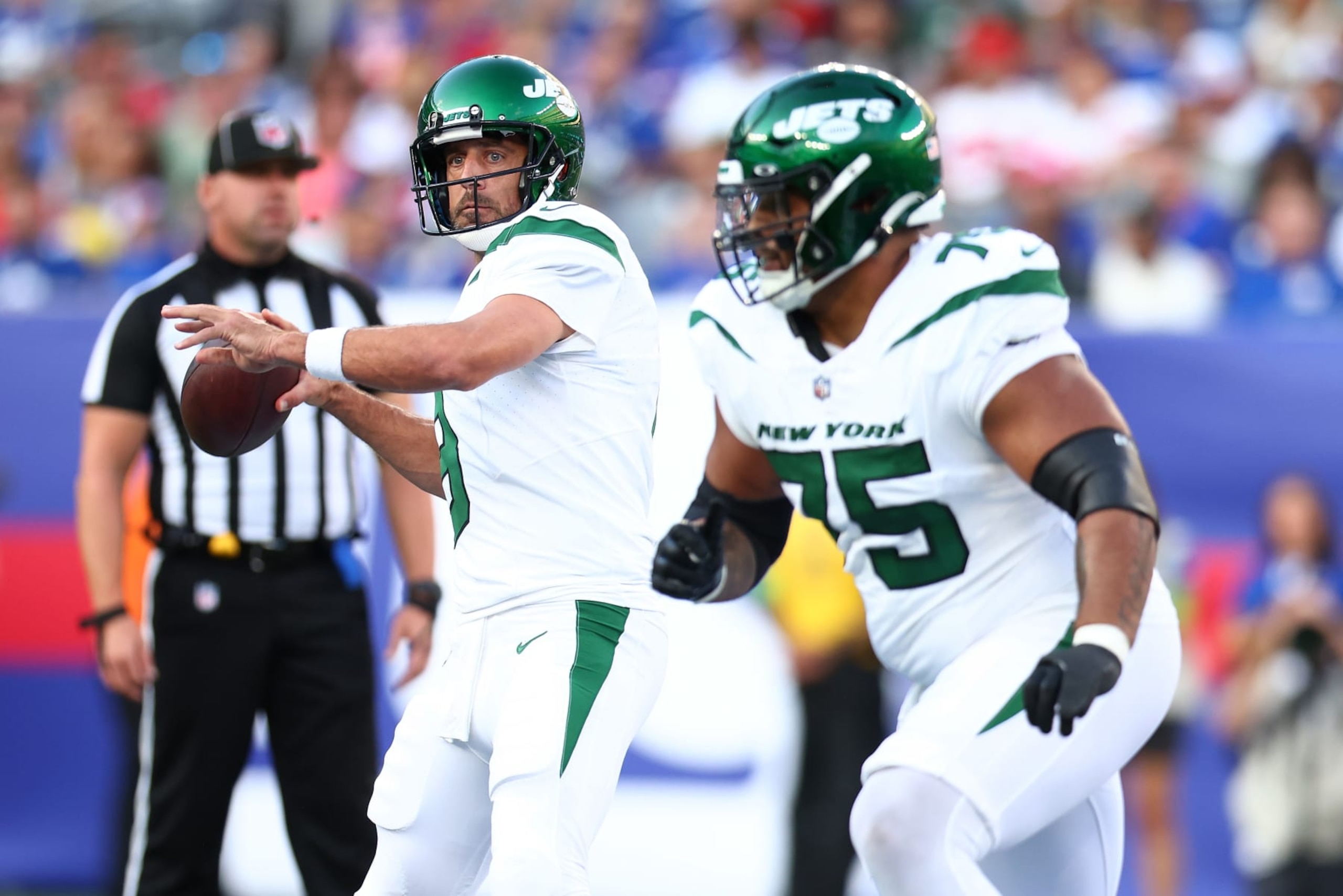 EAST RUTHERFORD, NEW JERSEY - AUGUST 26: Aaron Rodgers #8 of the New York Jets passes the ball against in the preseason game against the New York Giants at MetLife Stadium on August 26, 2023 in East Rutherford, New Jersey. (Photo by Mike Stobe/Getty Images)
