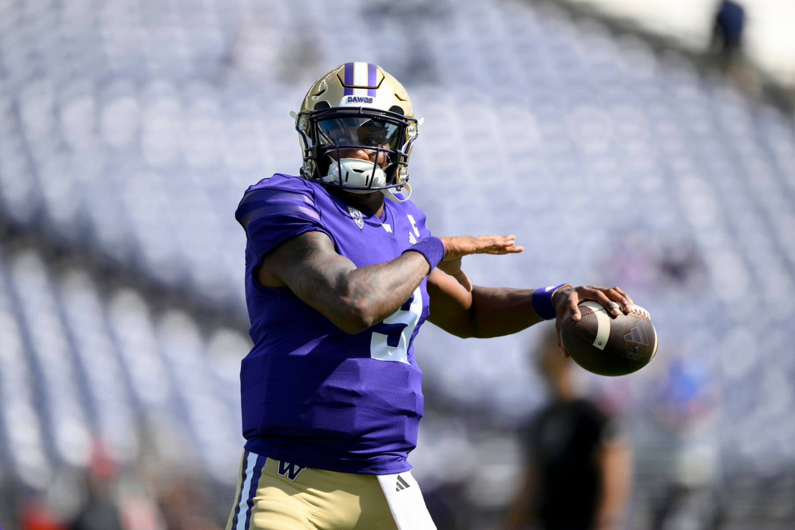 SEATTLE, WASHINGTON - SEPTEMBER 02: Michael Penix Jr. #9 of the Washington Huskies warms up before the game against the Boise State Broncos at Husky Stadium on September 02, 2023 in Seattle, Washington. (Photo by Alika Jenner/Getty Images)