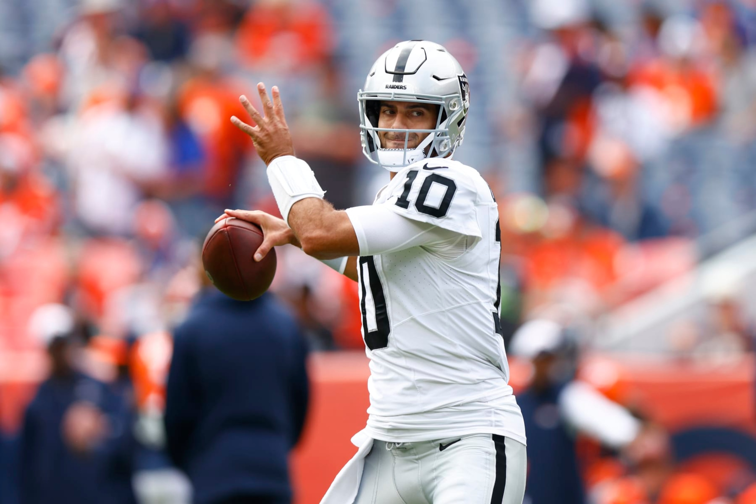 DENVER, COLORADO - SEPTEMBER 10: Jimmy Garoppolo #10 of the Las Vegas Raiders warms-up prior to a game against the Denver Broncos at Empower Field At Mile High on September 10, 2023 in Denver, Colorado. (Photo by Justin Edmonds/Getty Images)