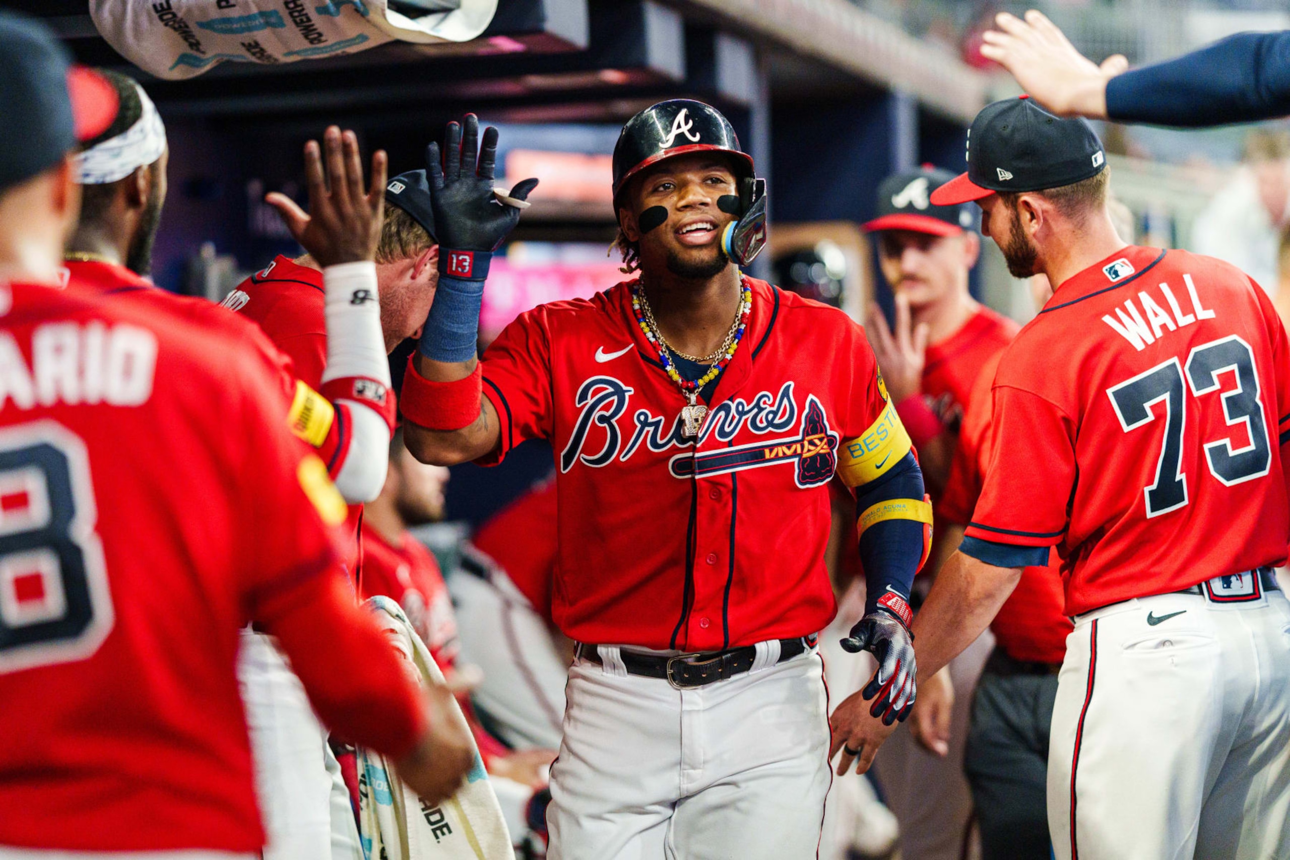 ATLANTA, GA - SEPTEMBER 8: Ronald Acuna Jr. #13 of the Atlanta Braves celebrates after hitting a home run in the fourth inning during the game against the Pittsburgh Pirates at Truist Park on September 8, 2023 in Atlanta, Georgia. (Photo by Matthew Grimes Jr./Atlanta Braves/Getty Images)