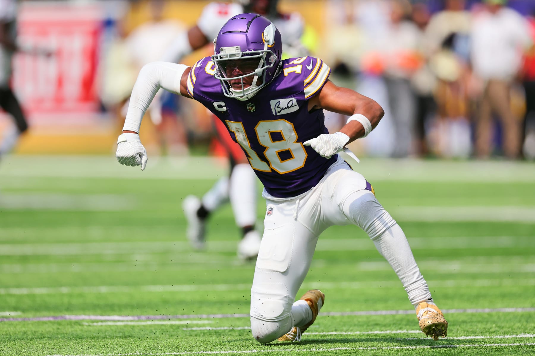 MINNEAPOLIS, MINNESOTA - SEPTEMBER 10: Justin Jefferson #18 of the Minnesota Vikings reacts after a play in the second quarter of a game against the Tampa Bay Buccaneers at U.S. Bank Stadium on September 10, 2023 in Minneapolis, Minnesota. (Photo by Adam Bettcher/Getty Images)