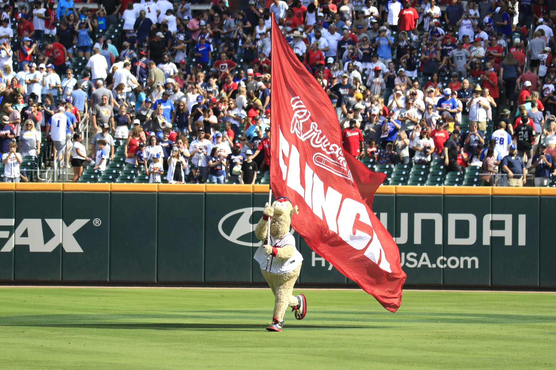 ATLANTA, GA - SEPTEMBER 10: The Atlanta Braves mascot Blooper waves the Playoff Clinched flag during the MLB game between the Pittsburg Pirates and the Atlanta Braves on September 10, 2023 at TRUIST Park in Atlanta, GA. (Photo by Jeff Robinson/Icon Sportswire via Getty Images)