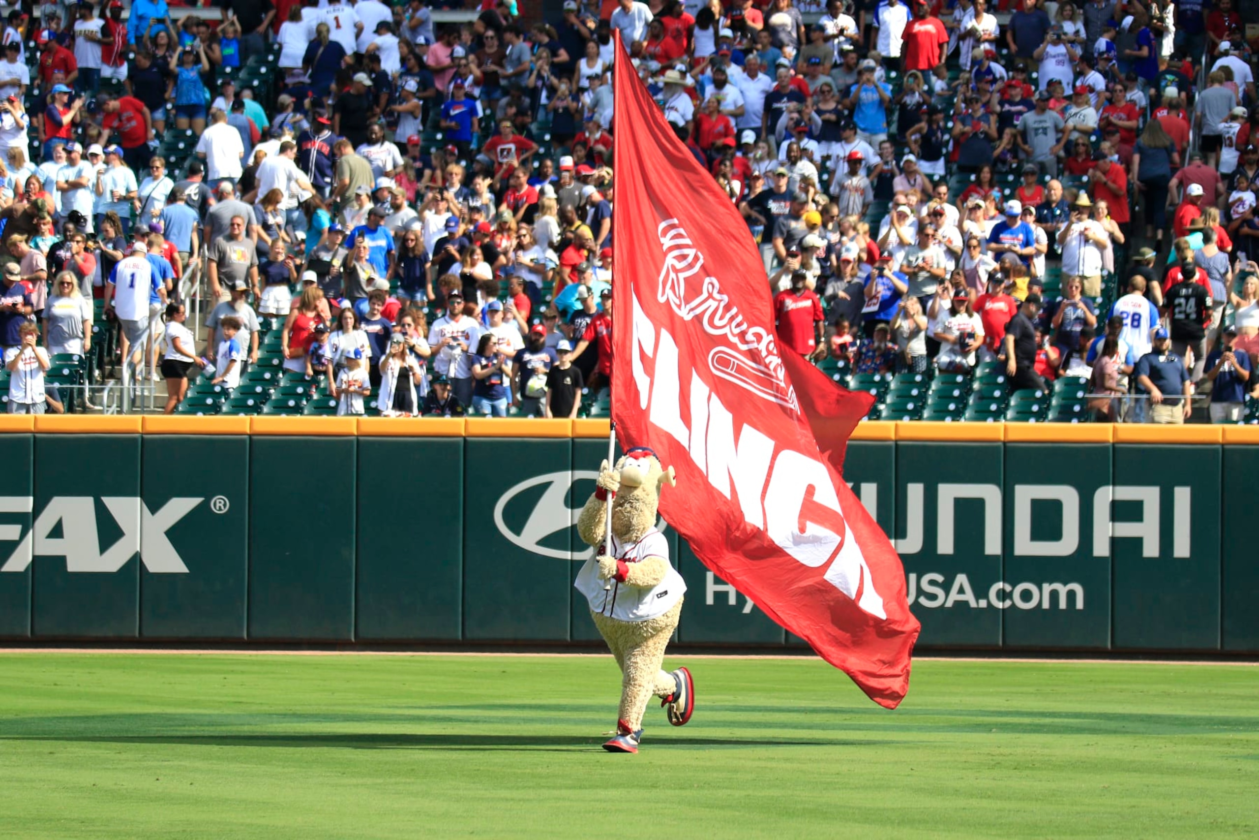 ATLANTA, GA - SEPTEMBER 10: The Atlanta Braves mascot Blooper waves the Playoff Clinched flag during the MLB game between the Pittsburg Pirates and the Atlanta Braves on September 10, 2023 at TRUIST Park in Atlanta, GA. (Photo by Jeff Robinson/Icon Sportswire via Getty Images)